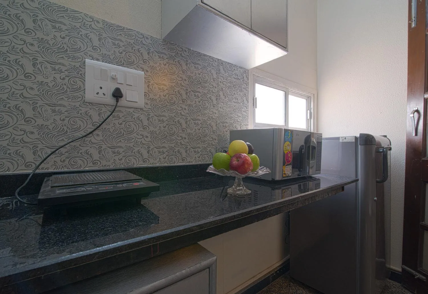 Kitchen or kitchenette in Perch Arbor Suites