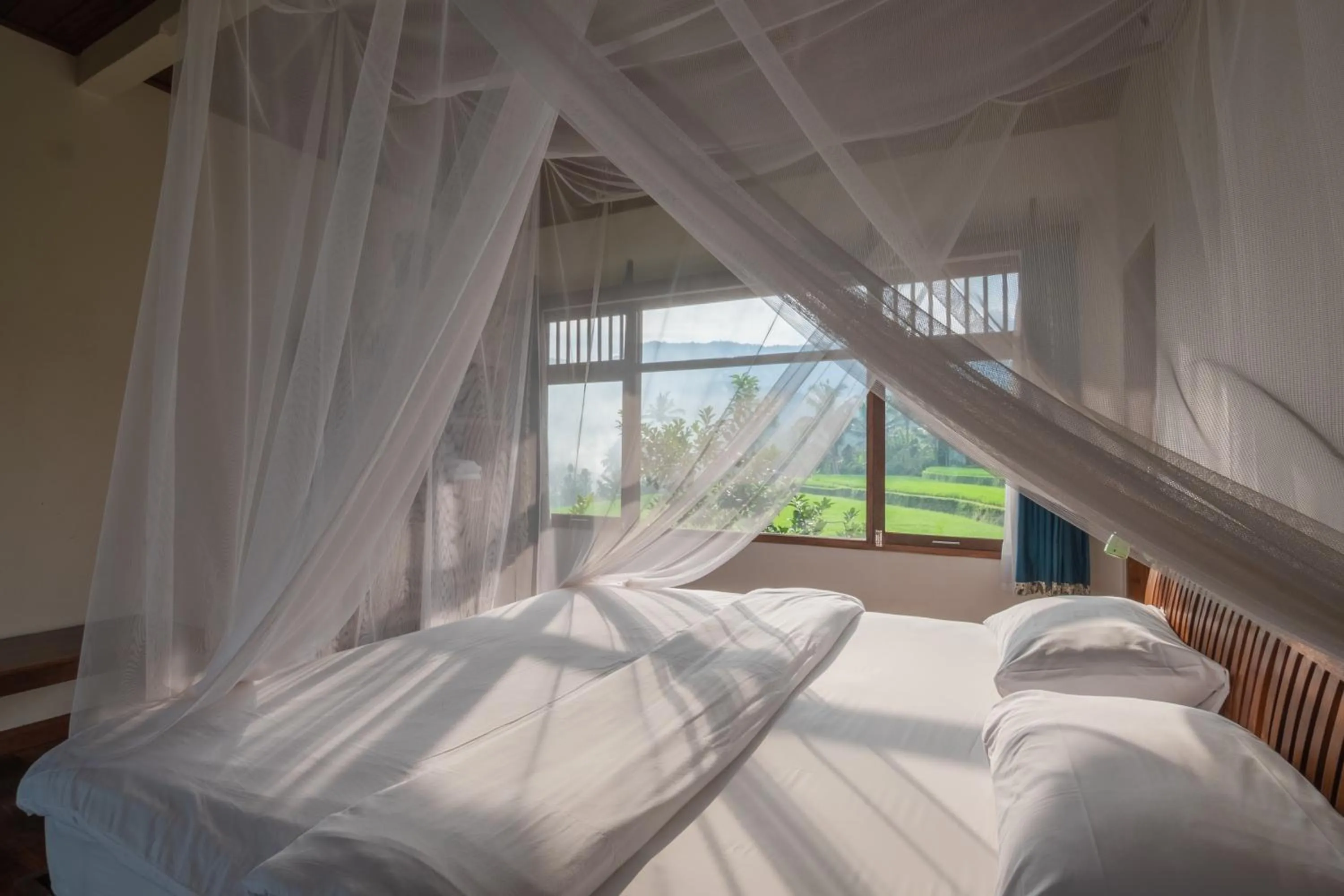 Bed in Lesong Hotel and Restaurant