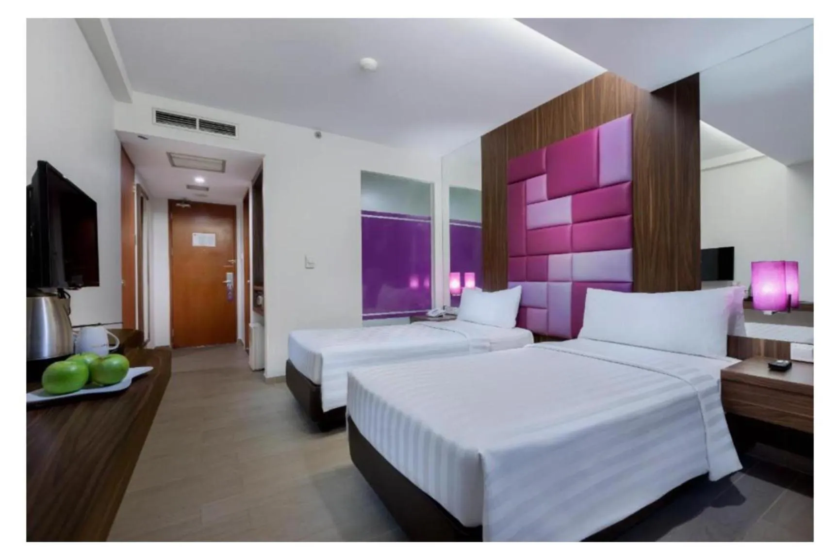 Bed in Quest Hotel Darmo - Surabaya by ASTON