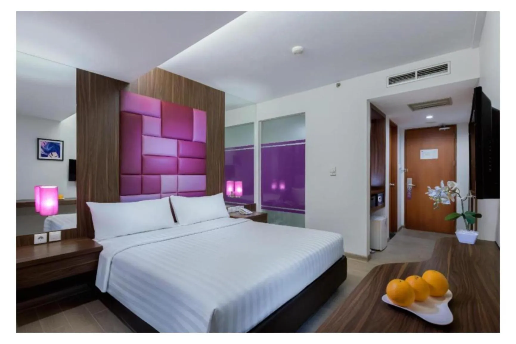 Bed in Quest Hotel Darmo - Surabaya by ASTON