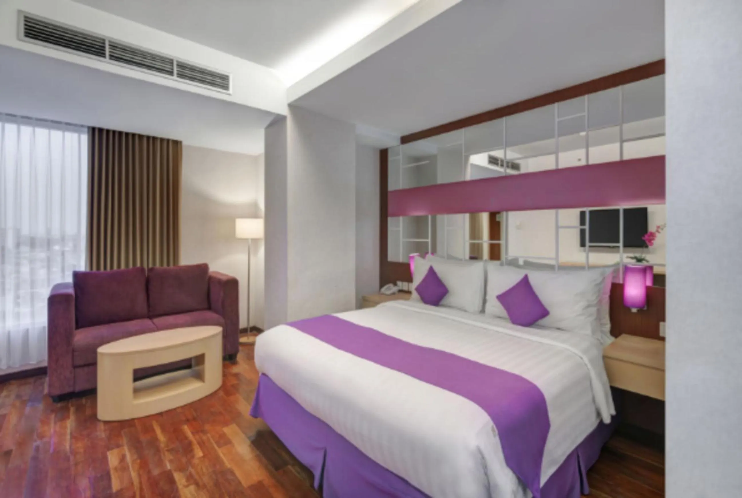 Bedroom, Bed in Quest Hotel Darmo - Surabaya by ASTON