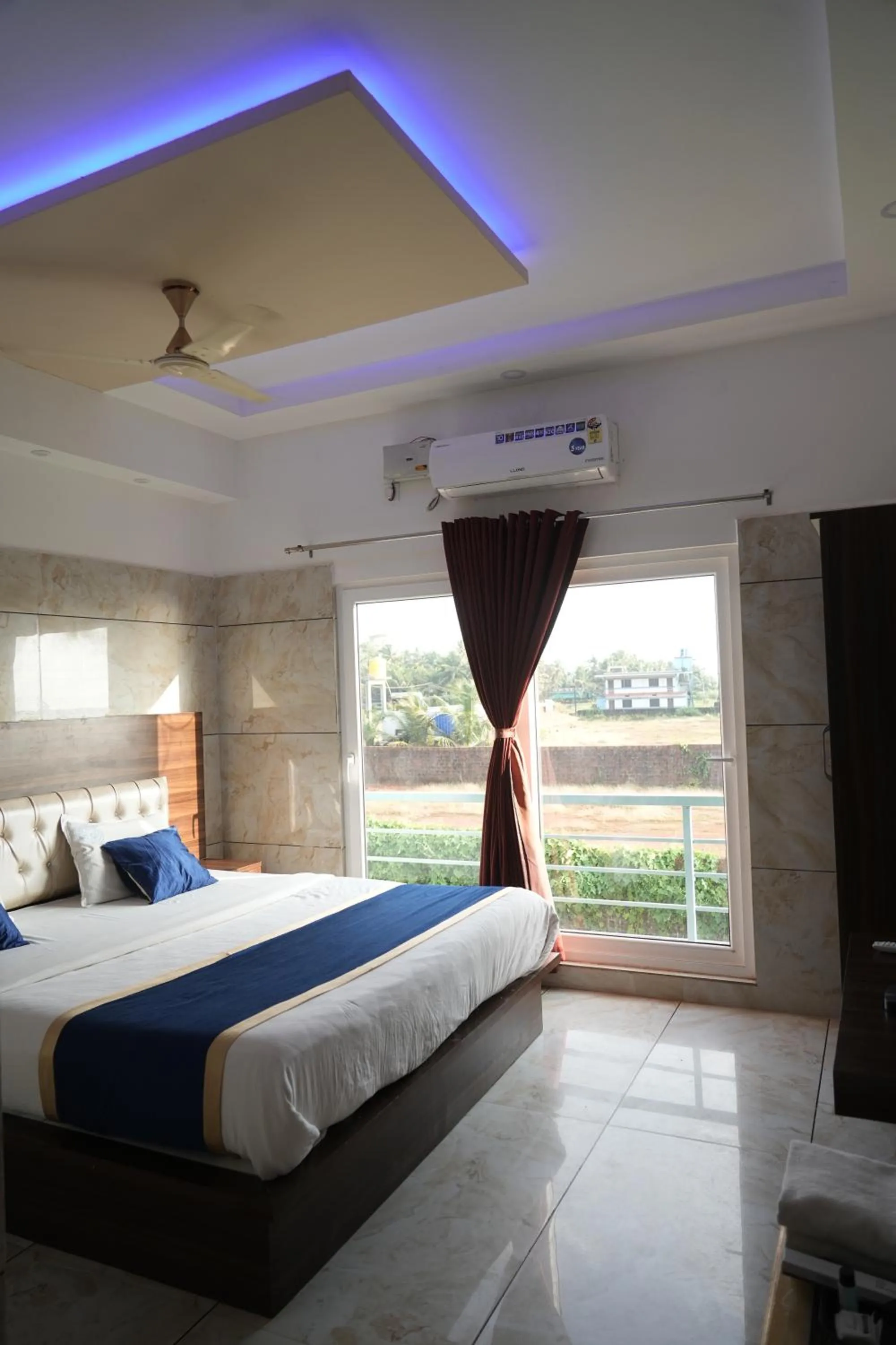 Bed in Blue Pearl Beach Guest House