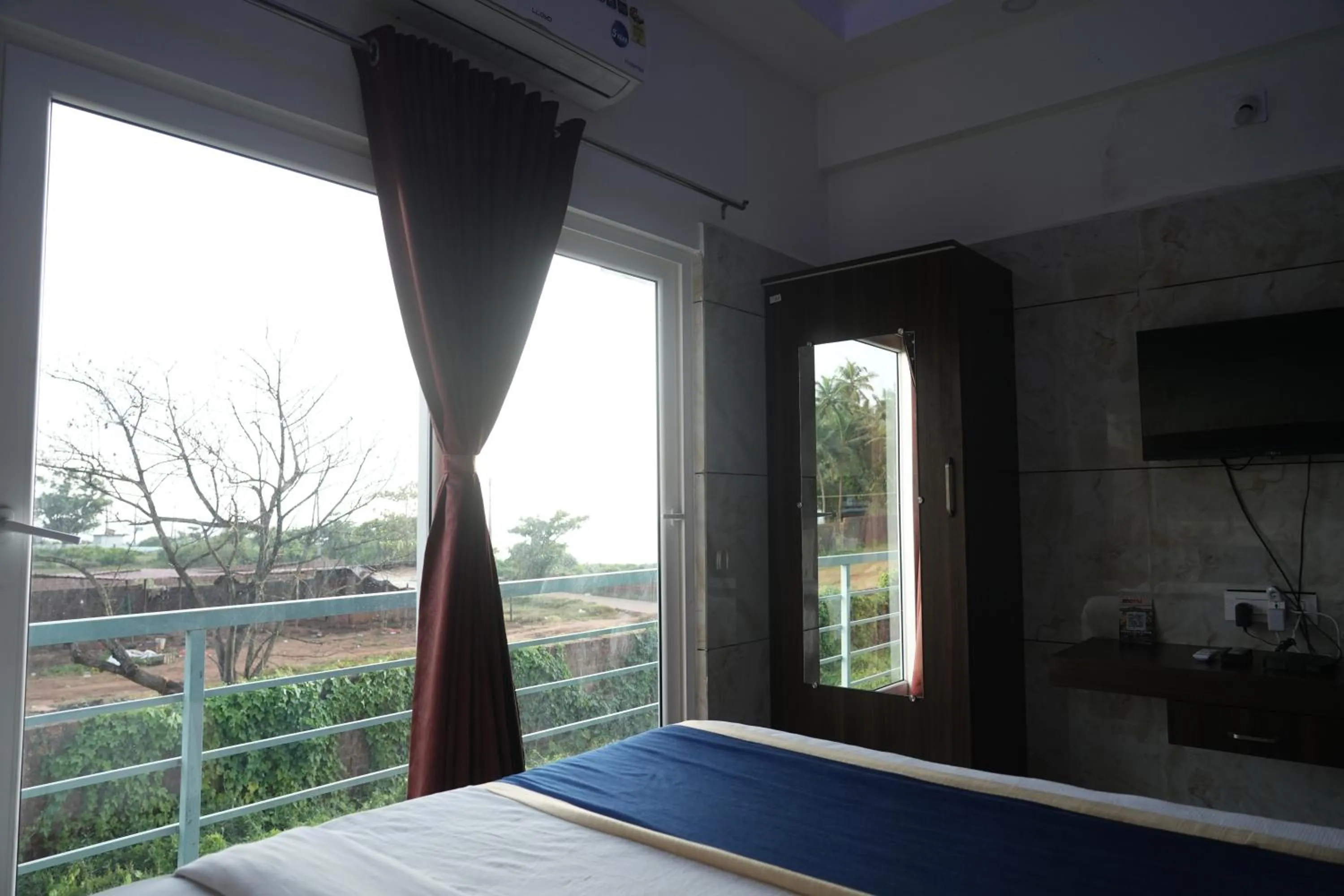 Bed in Blue Pearl Beach Guest House