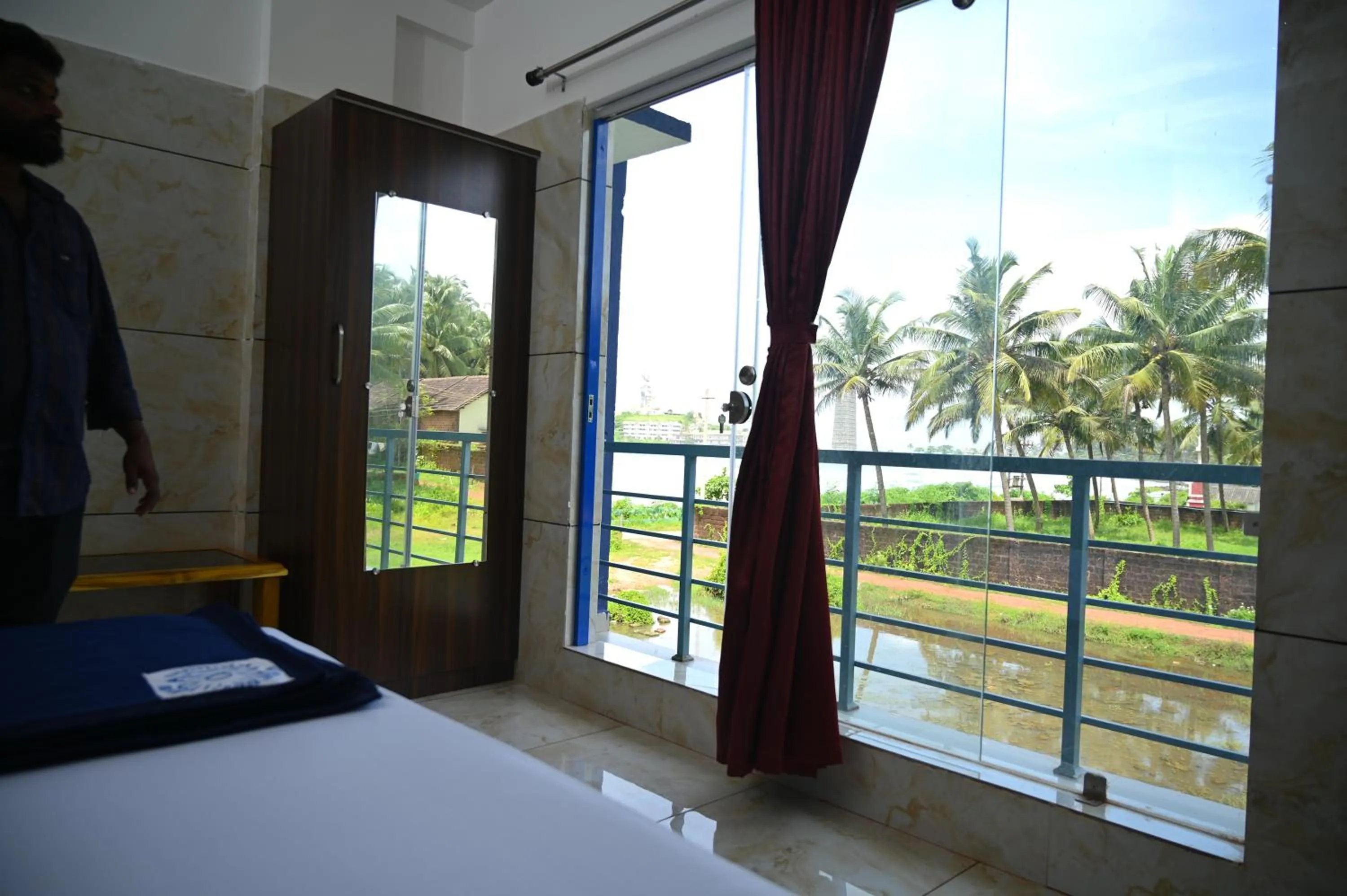 Bed in Blue Pearl Beach Guest House