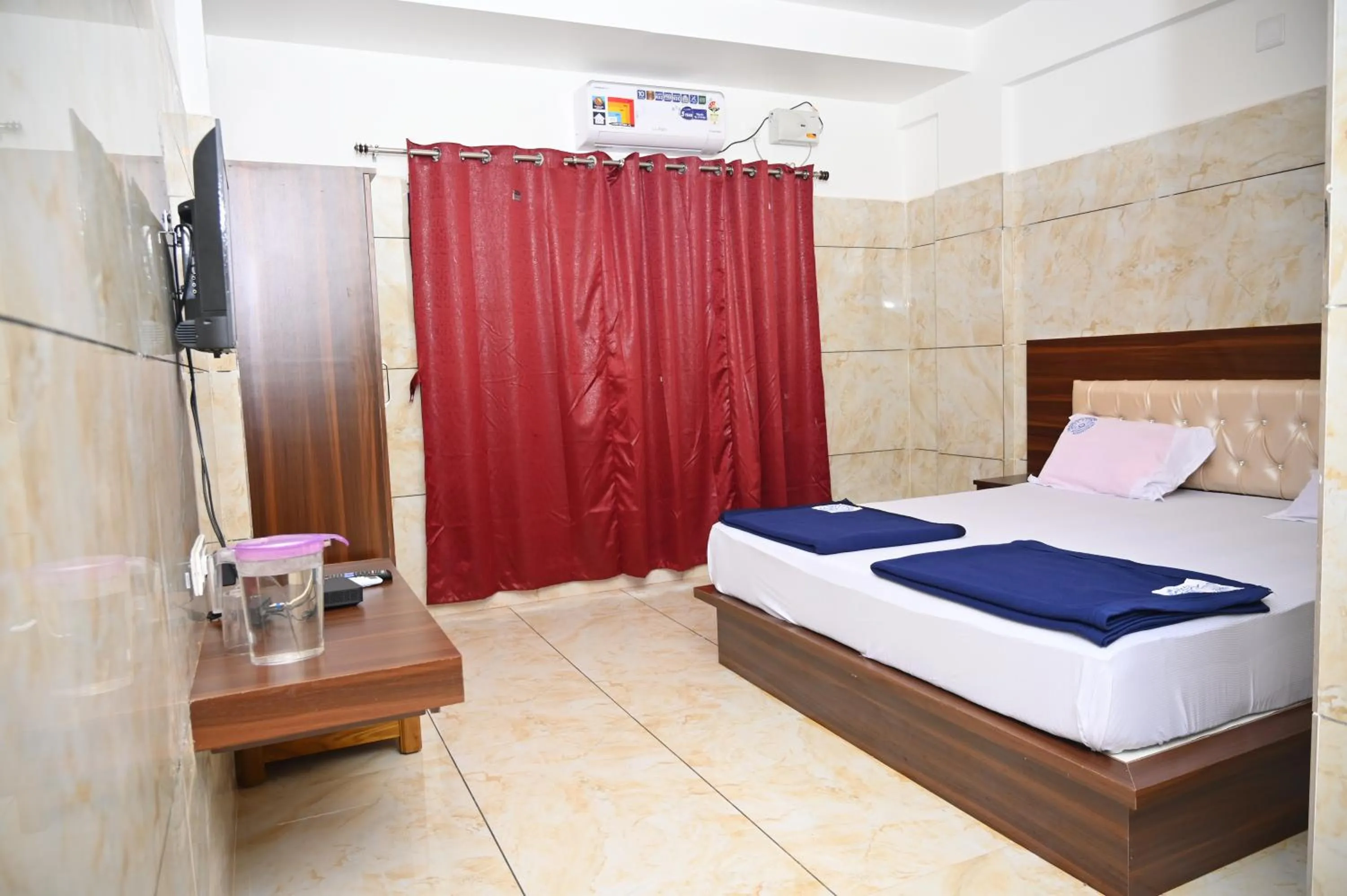 Bed in Blue Pearl Beach Guest House