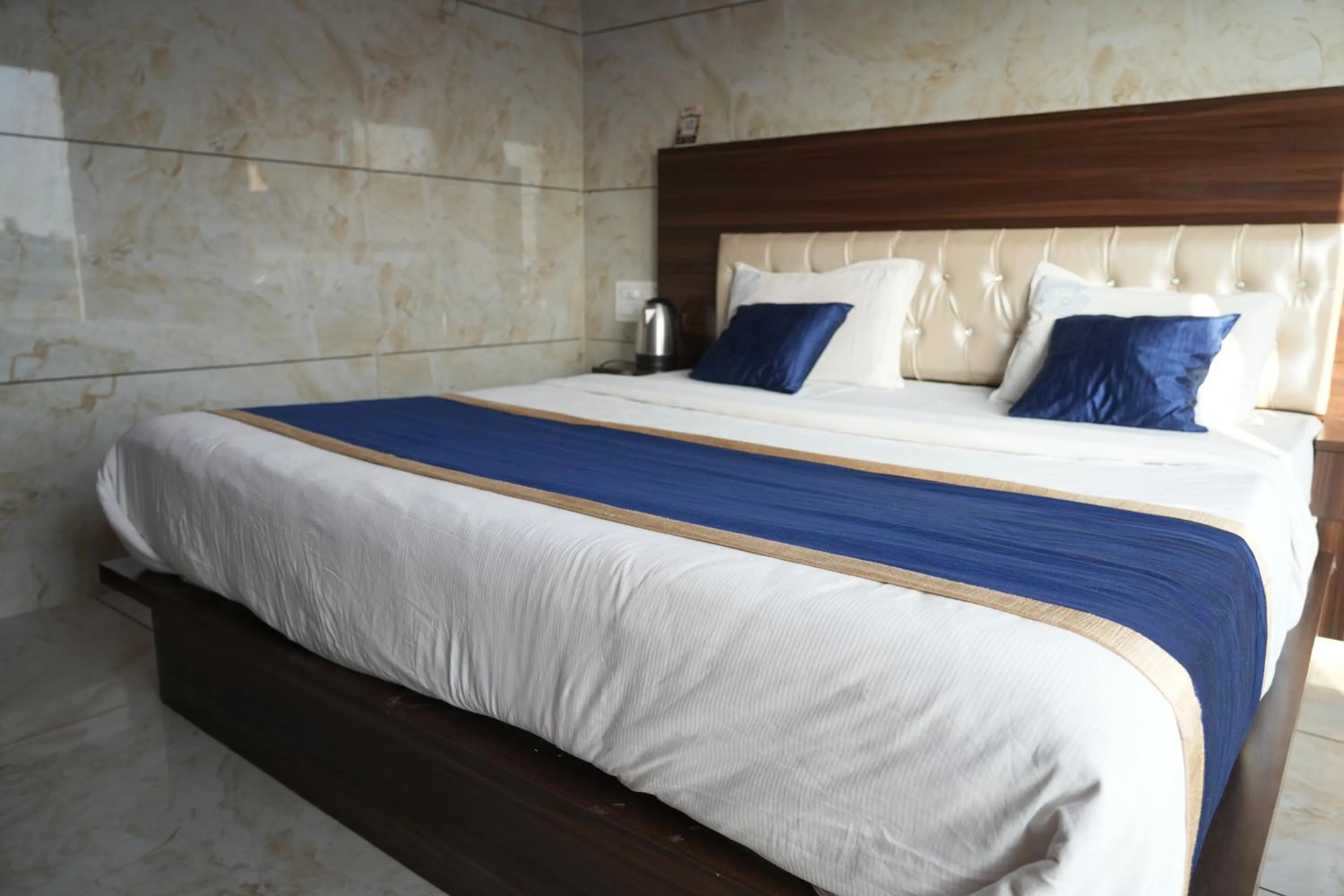 Bed in Blue Pearl Beach Guest House