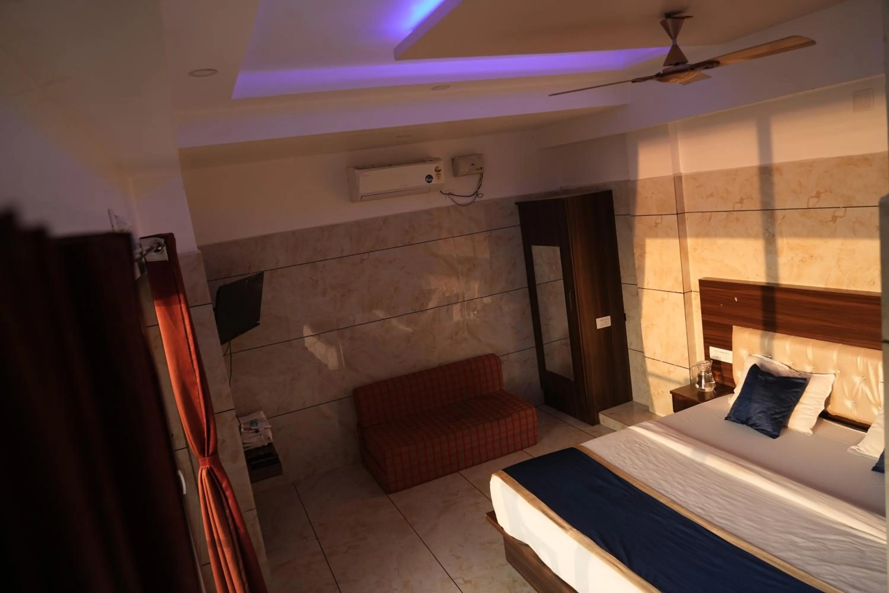 Bed in Blue Pearl Beach Guest House