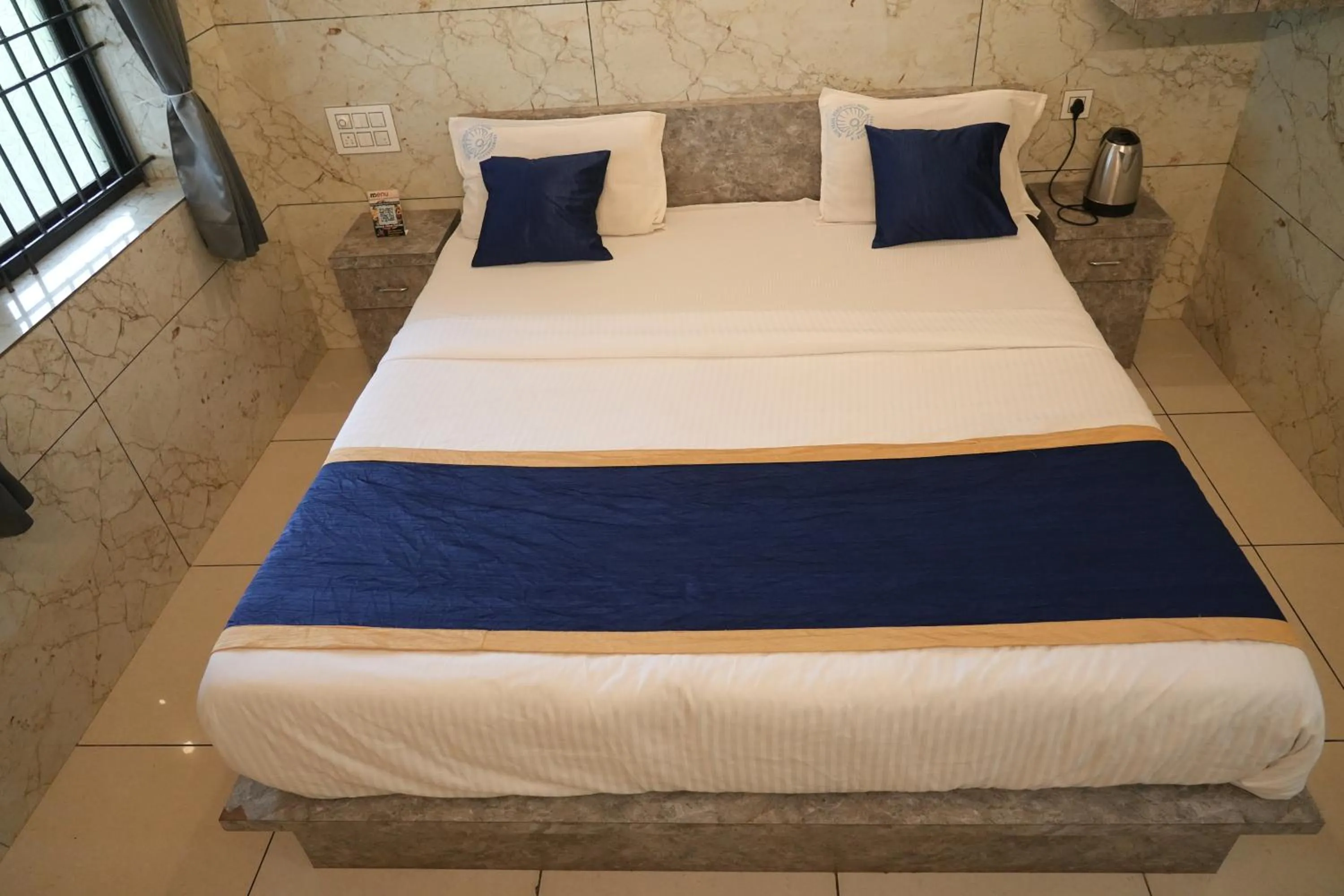 Bed in Blue Pearl Beach Guest House