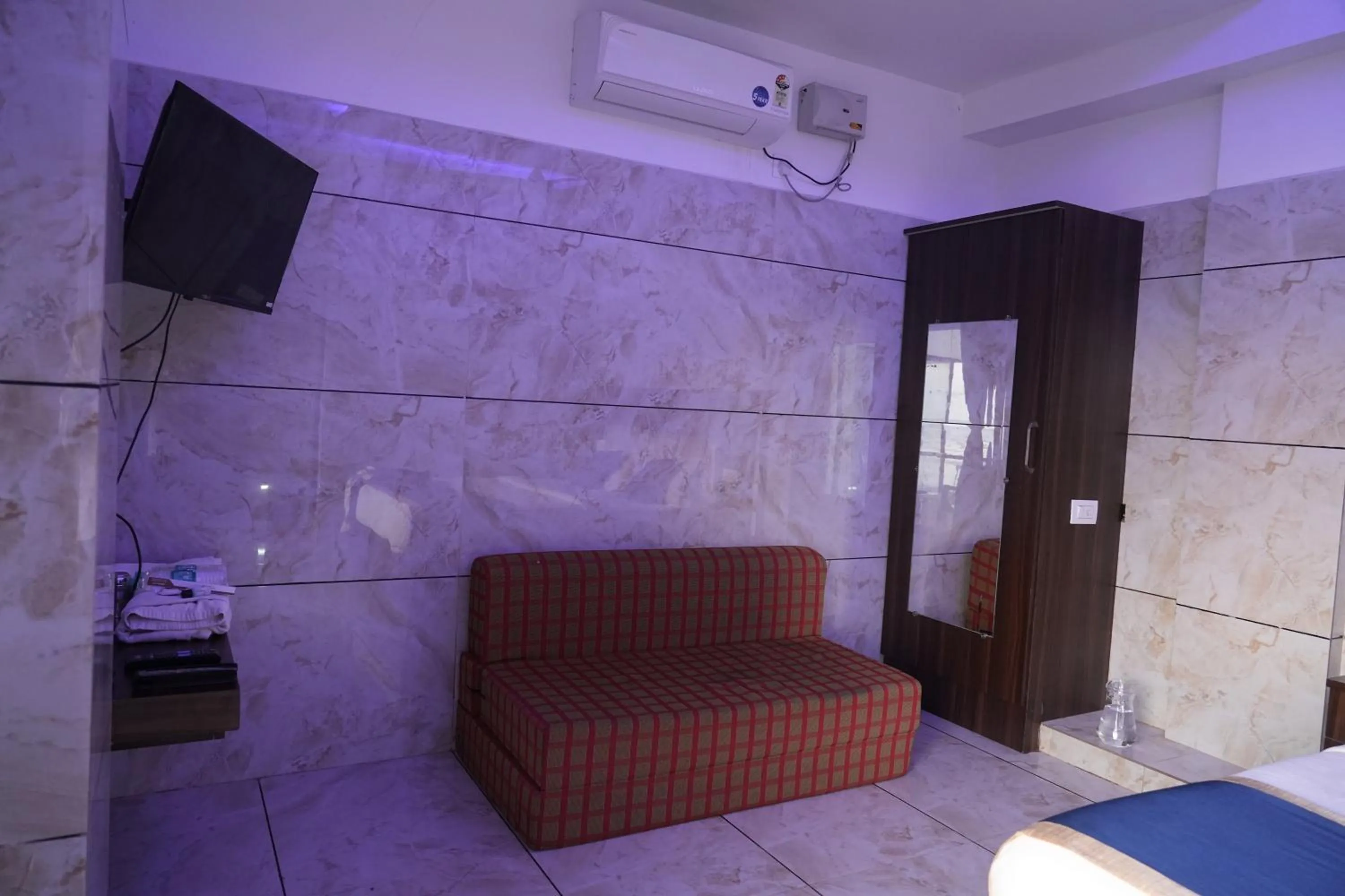 Bed in Blue Pearl Beach Guest House