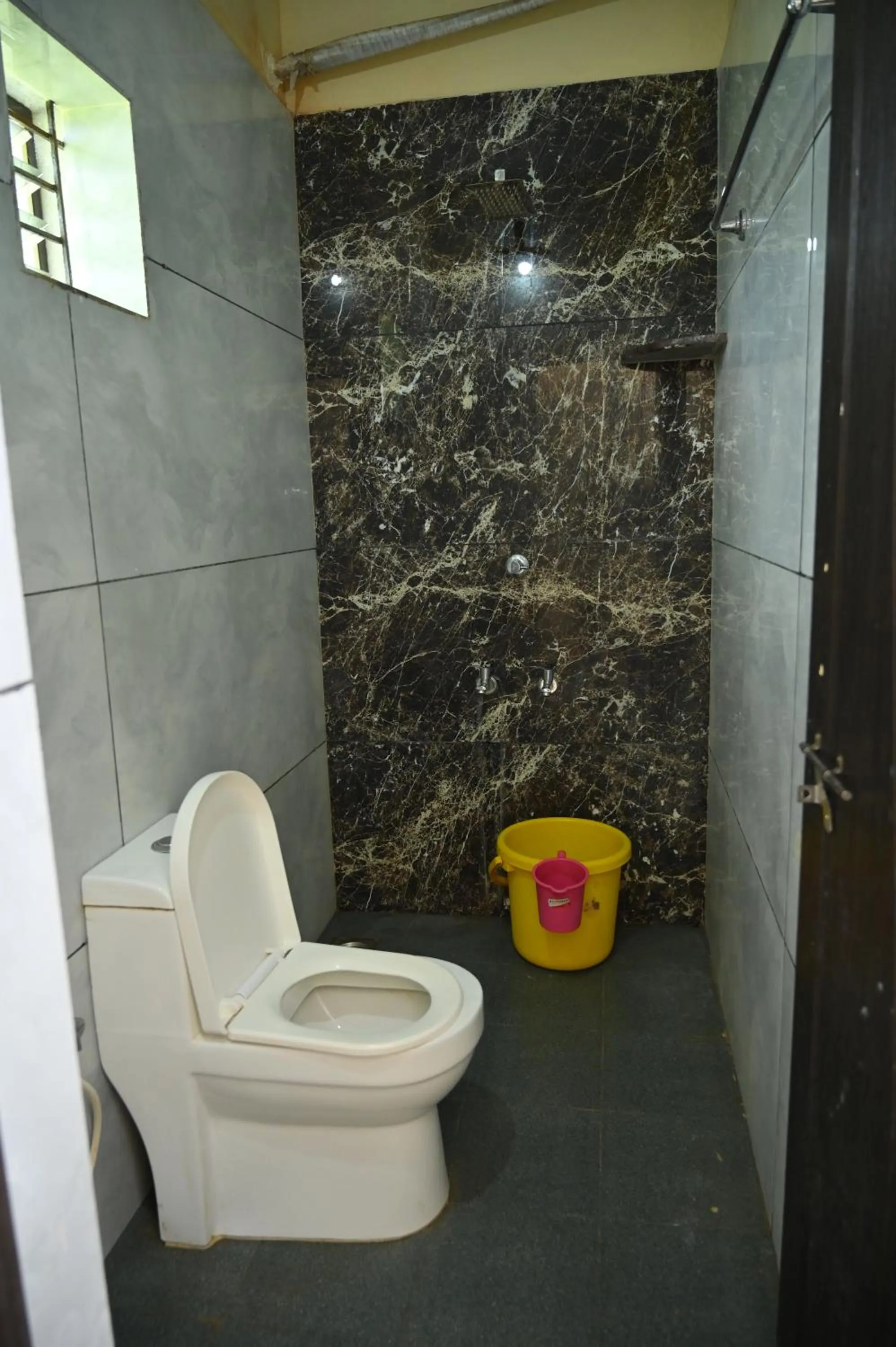 Toilet in Blue Pearl Beach Guest House