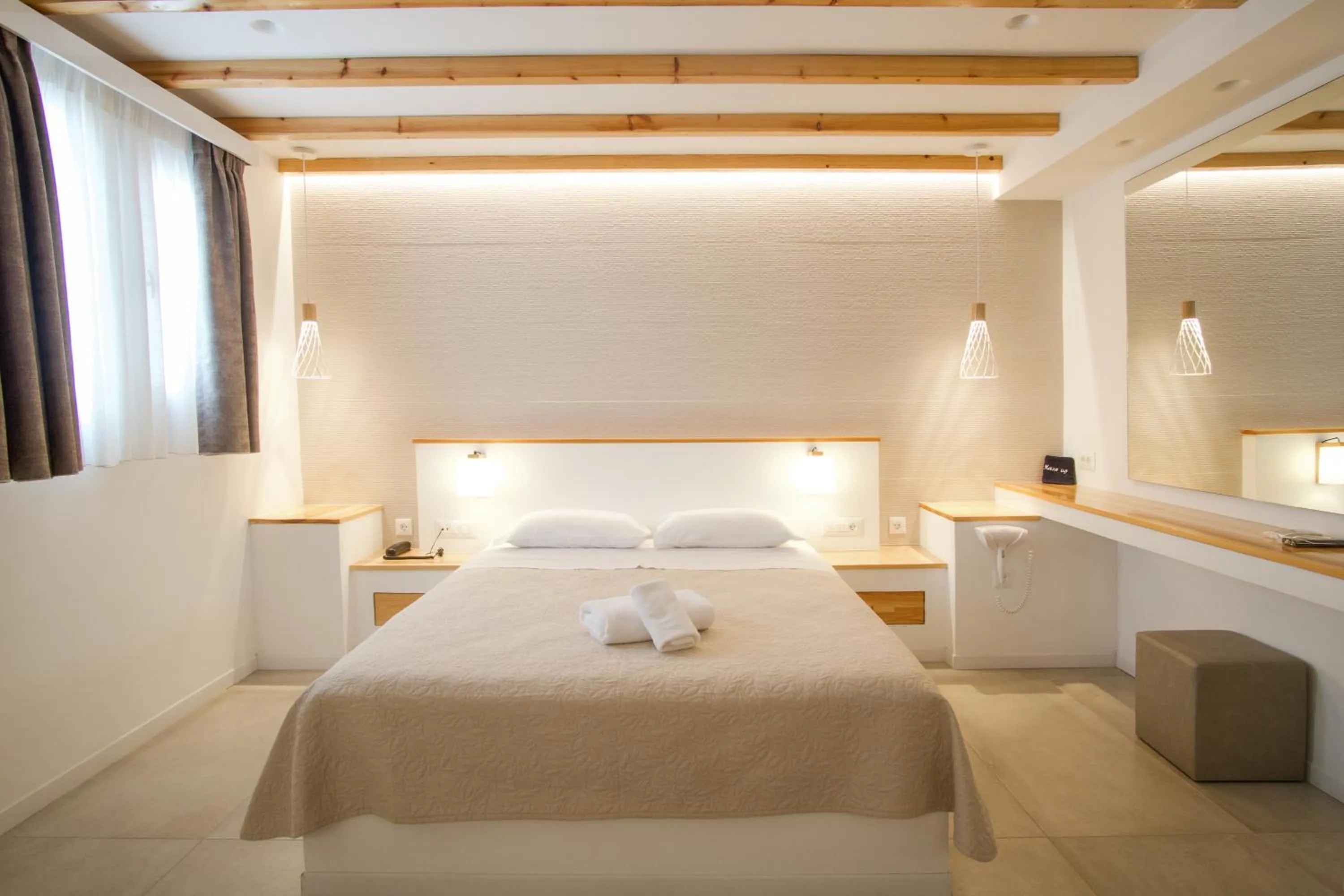 Bed in Kritikakis Village Hotel