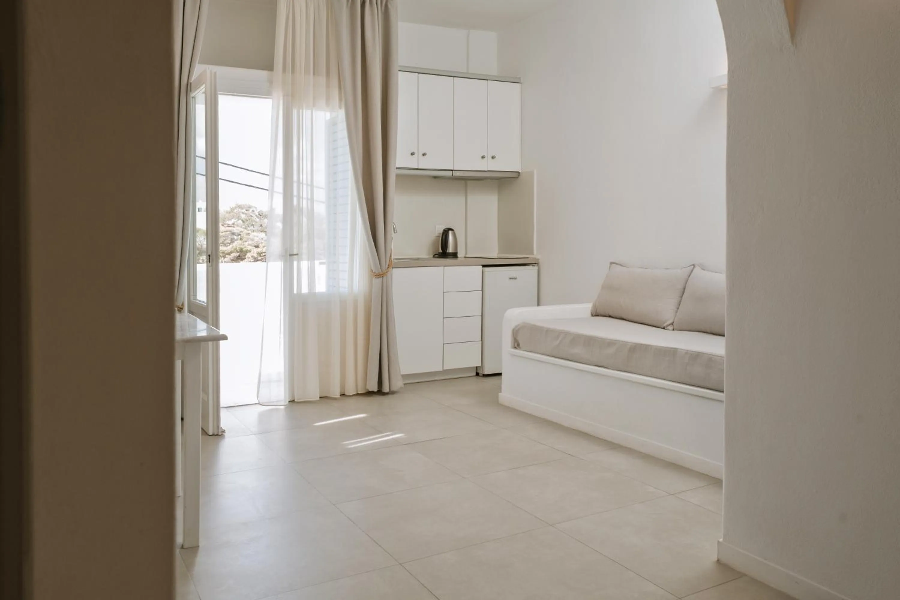 Living room, Bed in Kritikakis Village Hotel