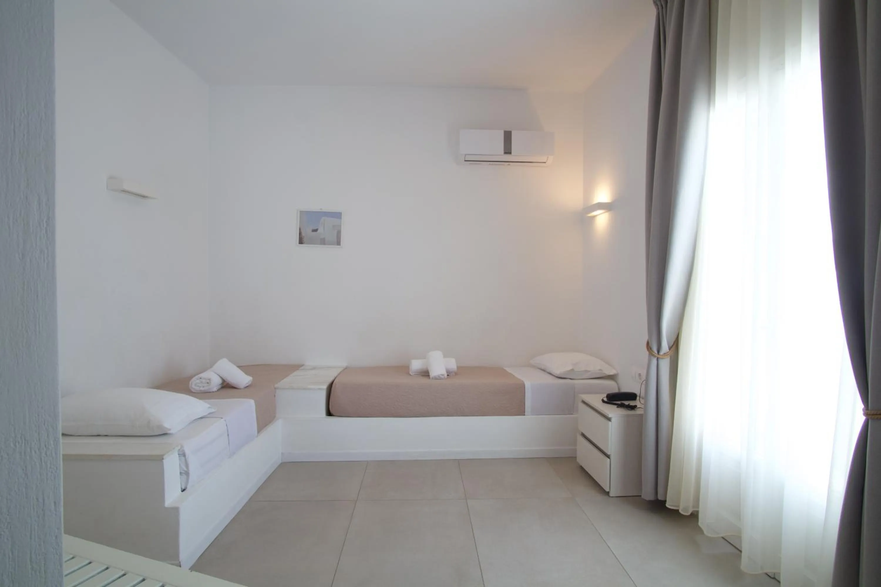 Bed in Kritikakis Village Hotel