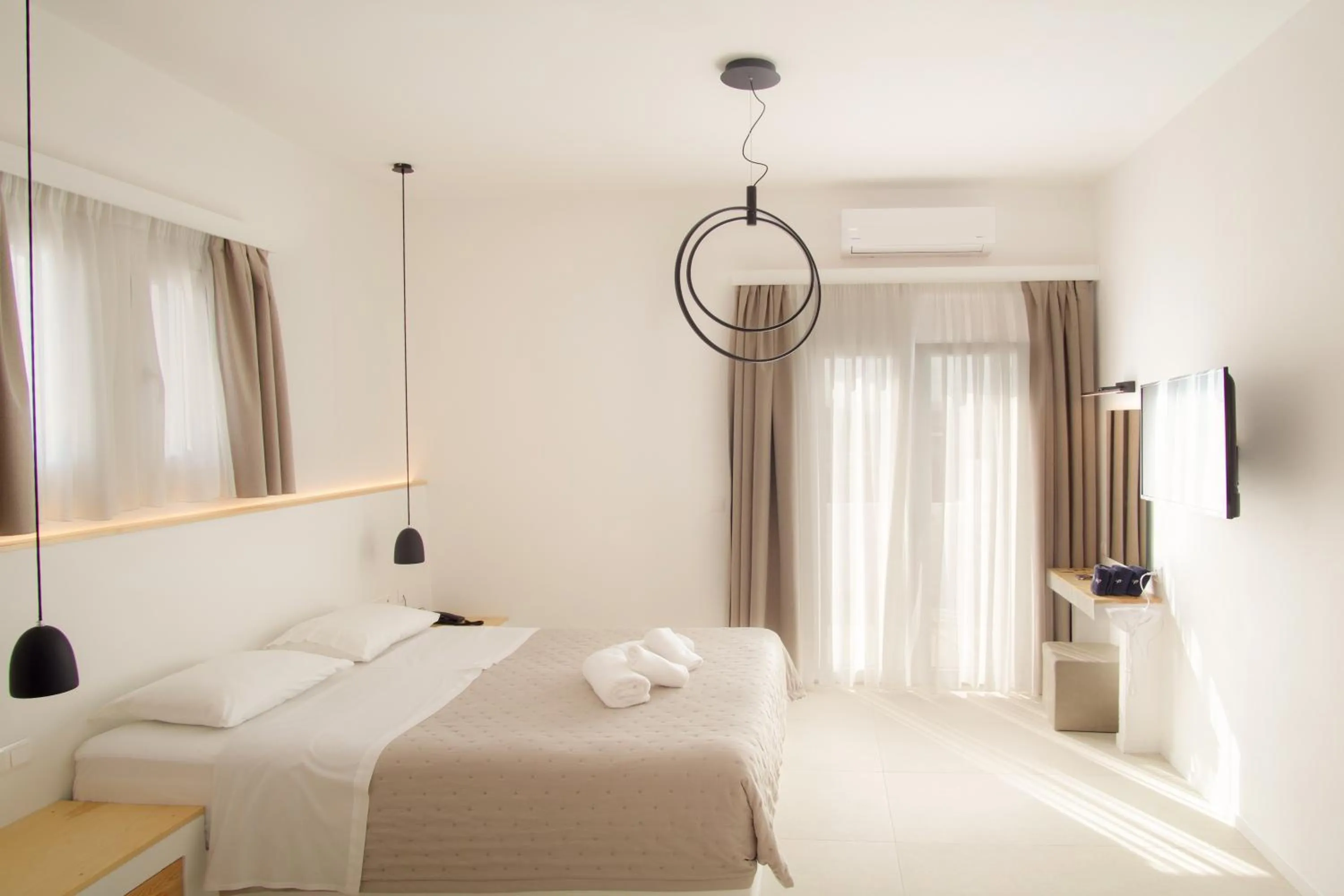 Bed in Kritikakis Village Hotel