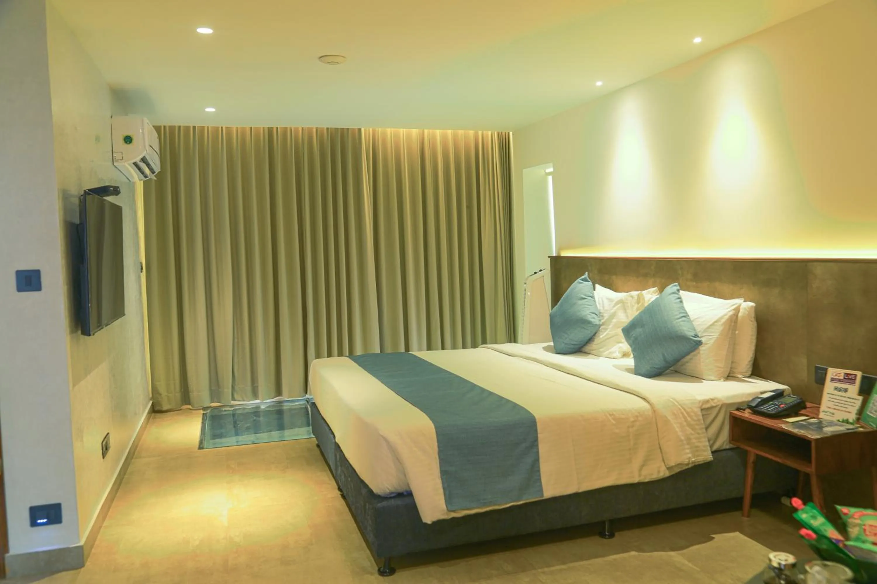 Bed in GReaT Trails Yercaud by GRT Hotels