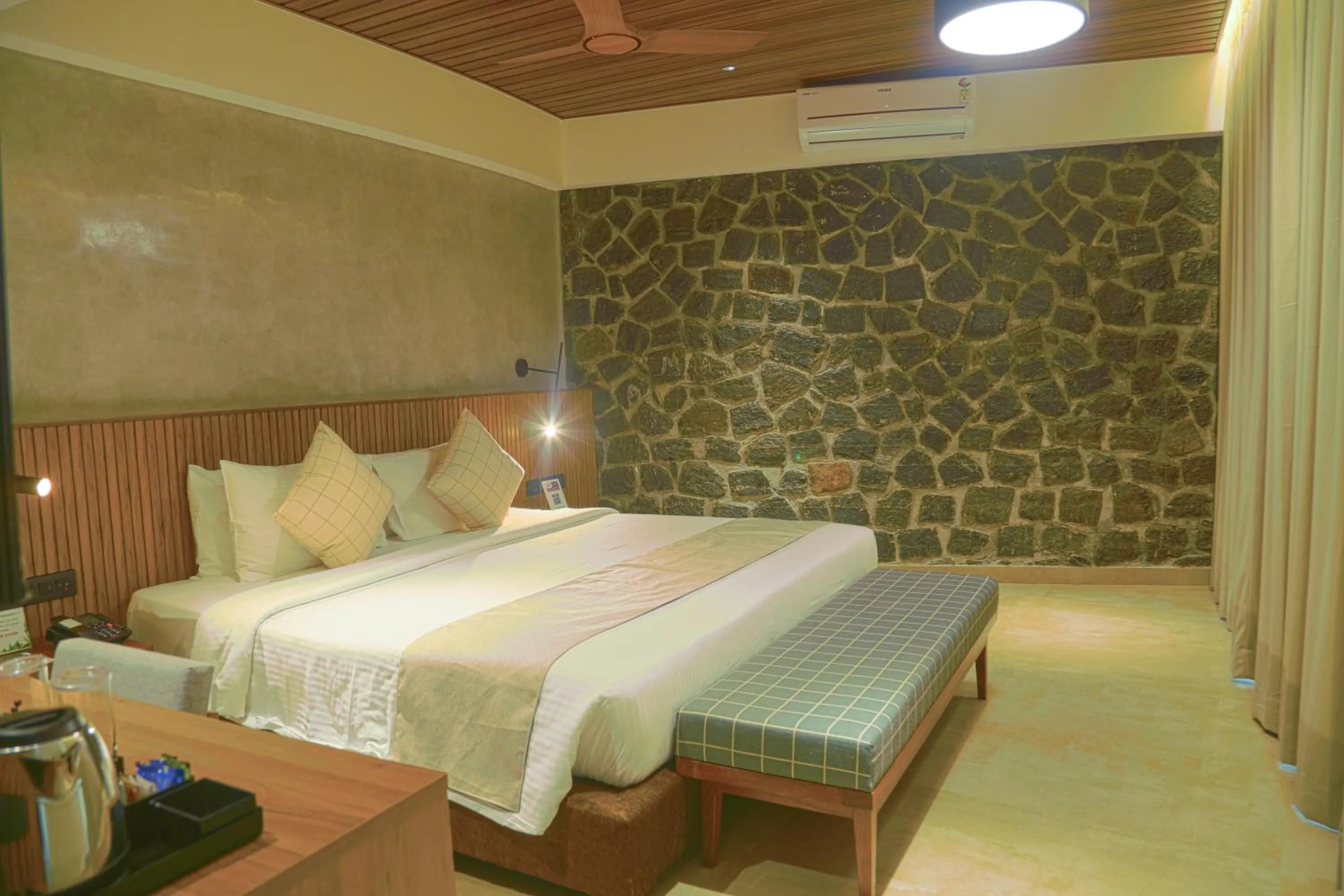 Bed in GReaT Trails Yercaud by GRT Hotels