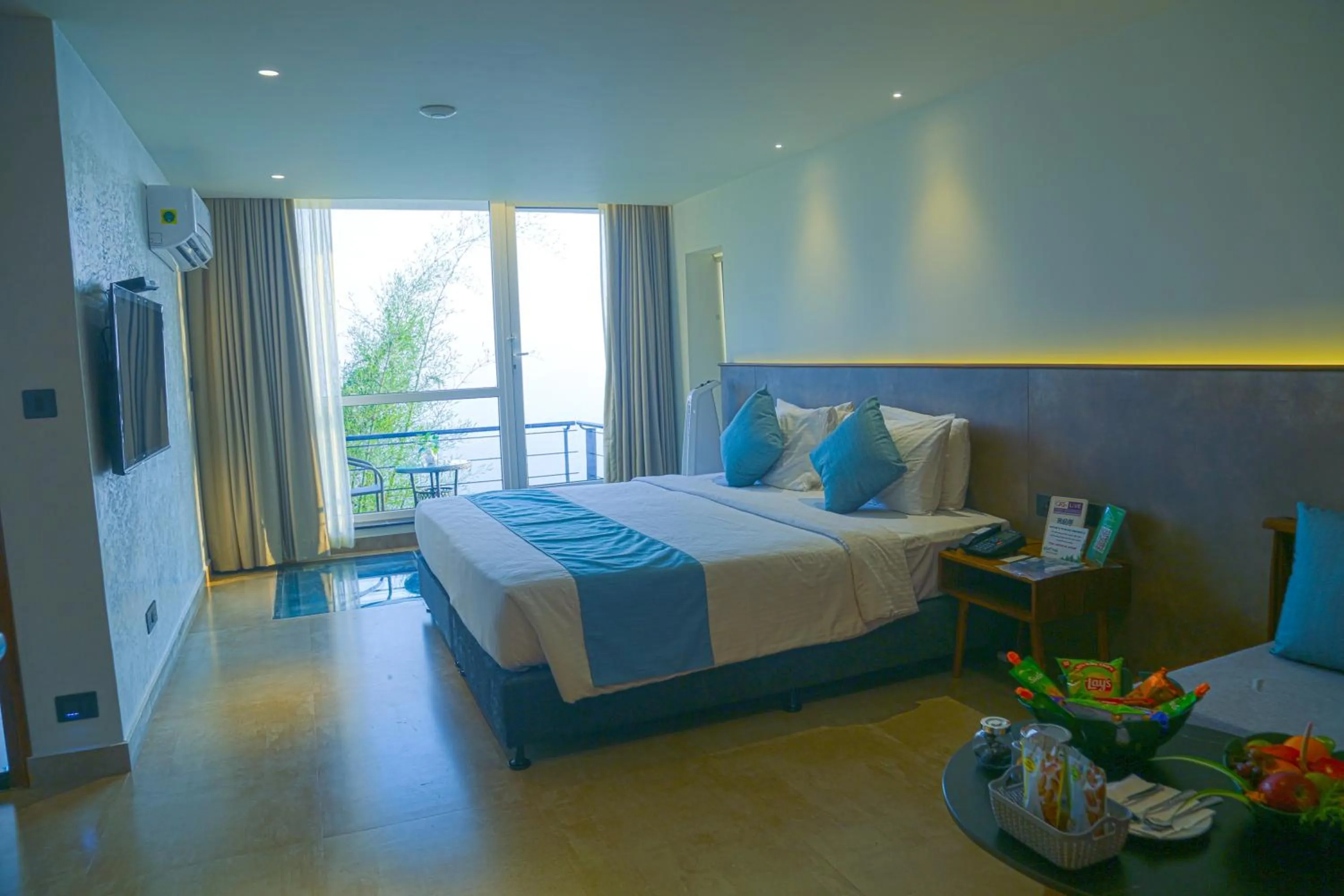 Bed in GReaT Trails Yercaud by GRT Hotels
