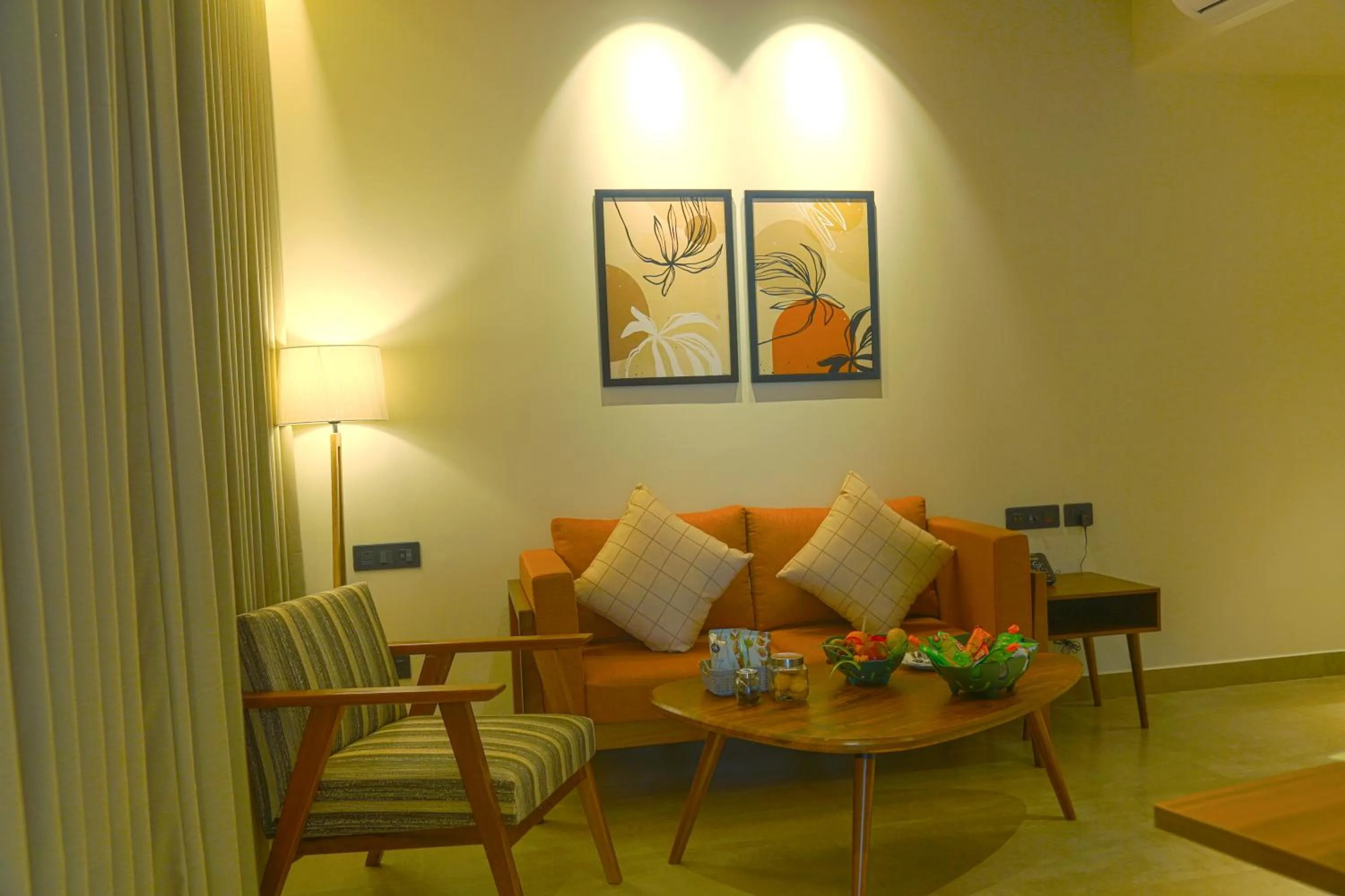 Living room in GReaT Trails Yercaud by GRT Hotels