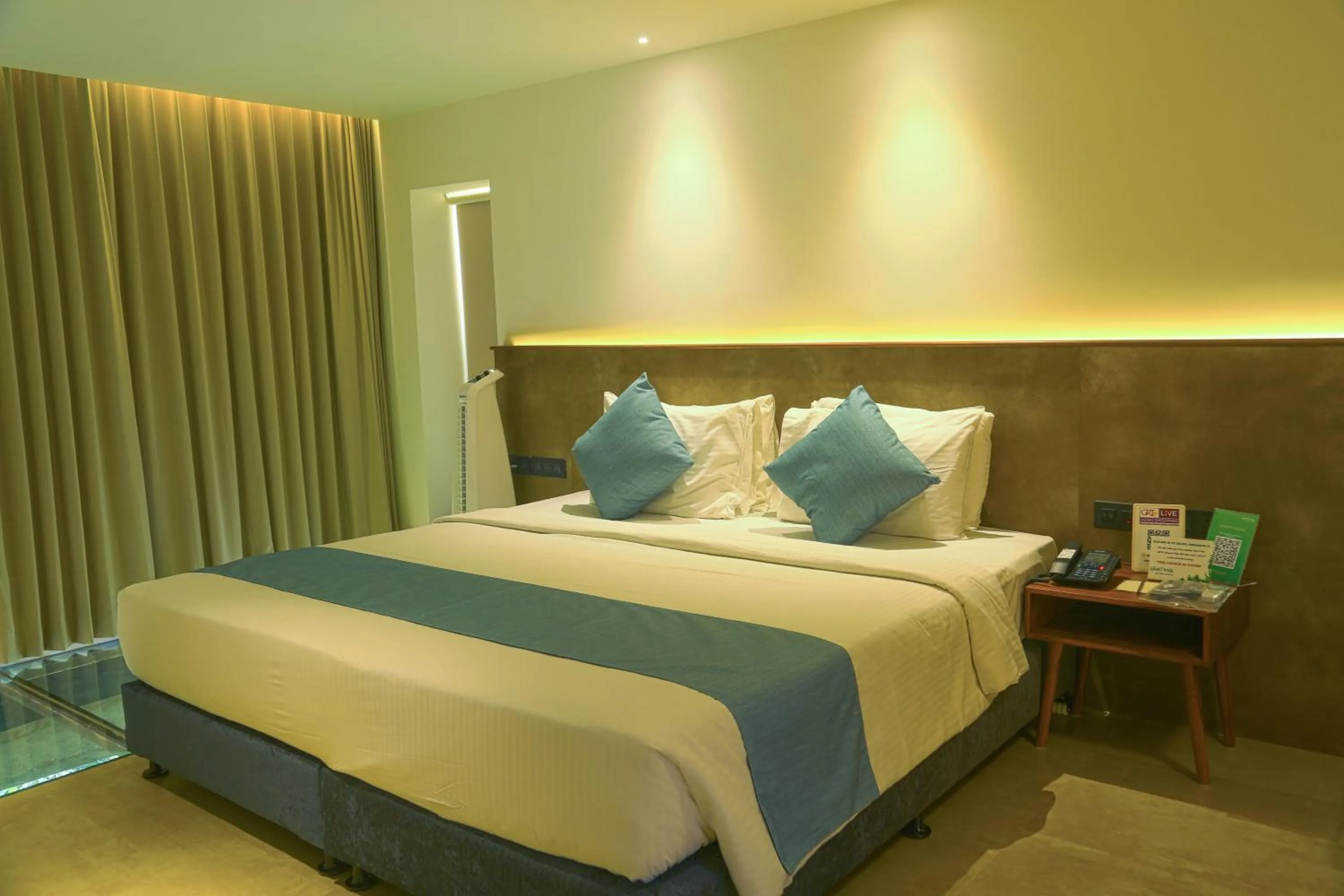Bed in GReaT Trails Yercaud by GRT Hotels