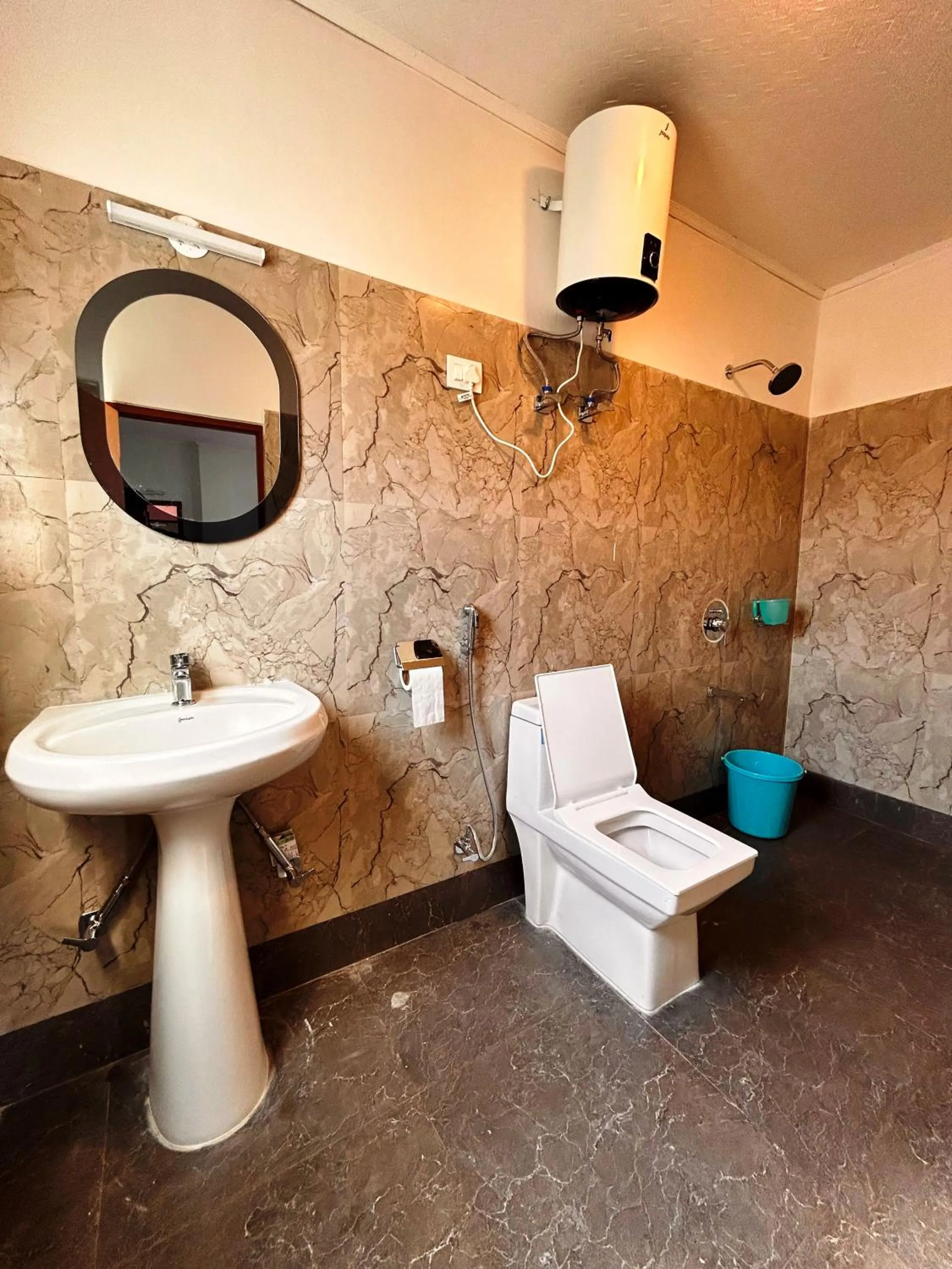 Bathroom in DISHA SILVER PEAK Hotel