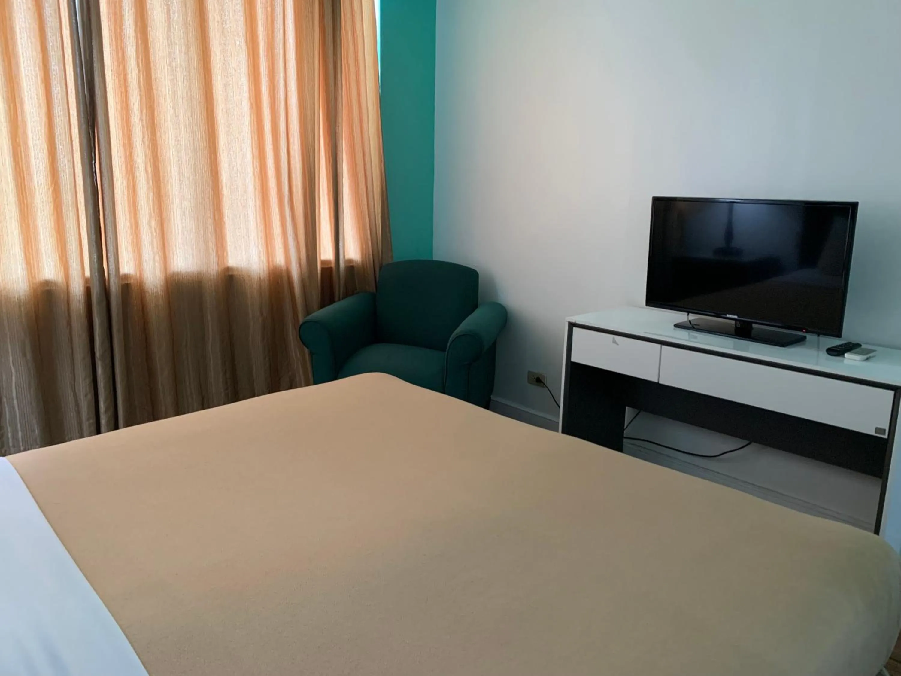 Bed in Pearl Manila Hotel