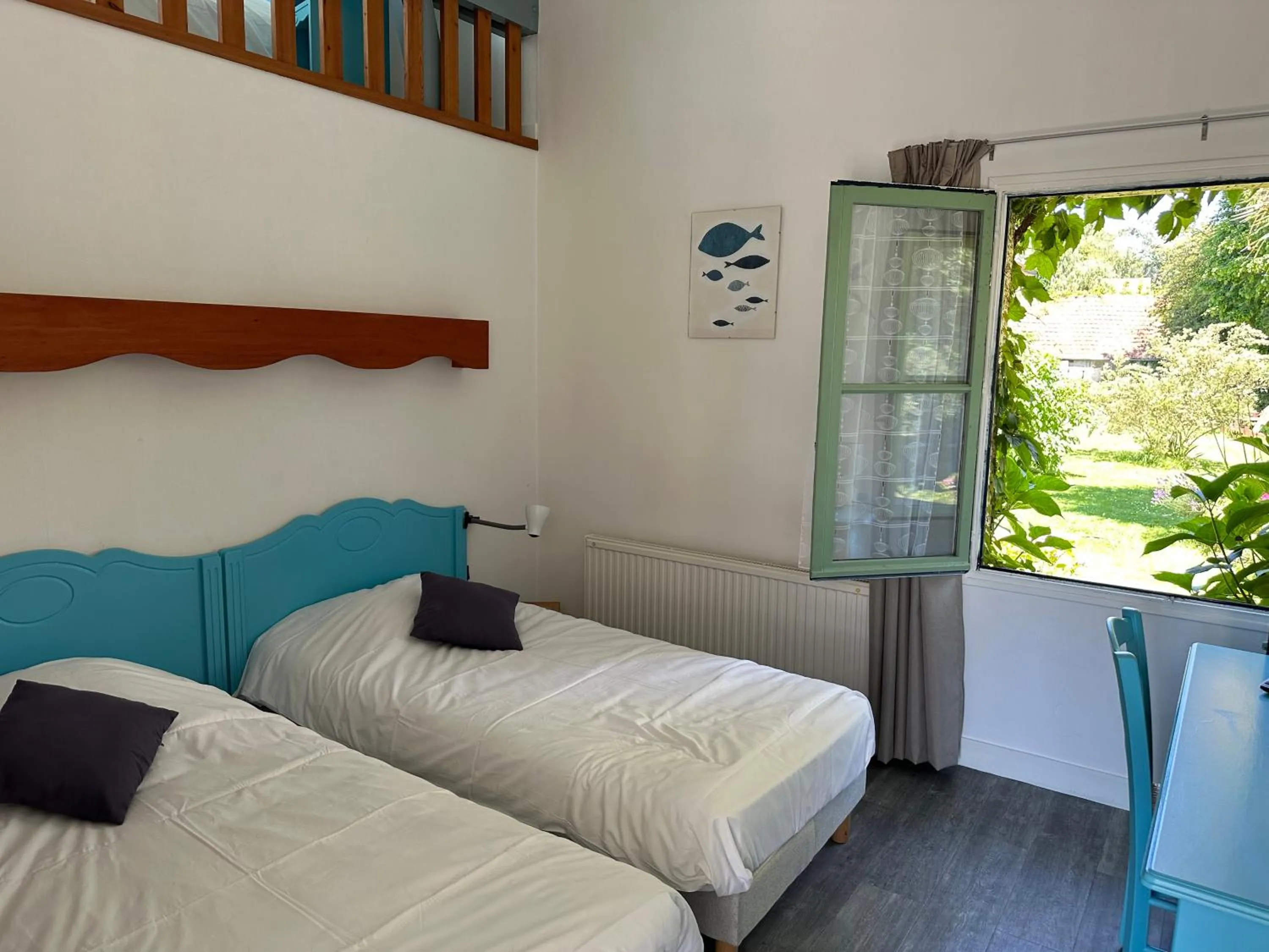 Bed in Logis Hôtel La Demeure du Perron