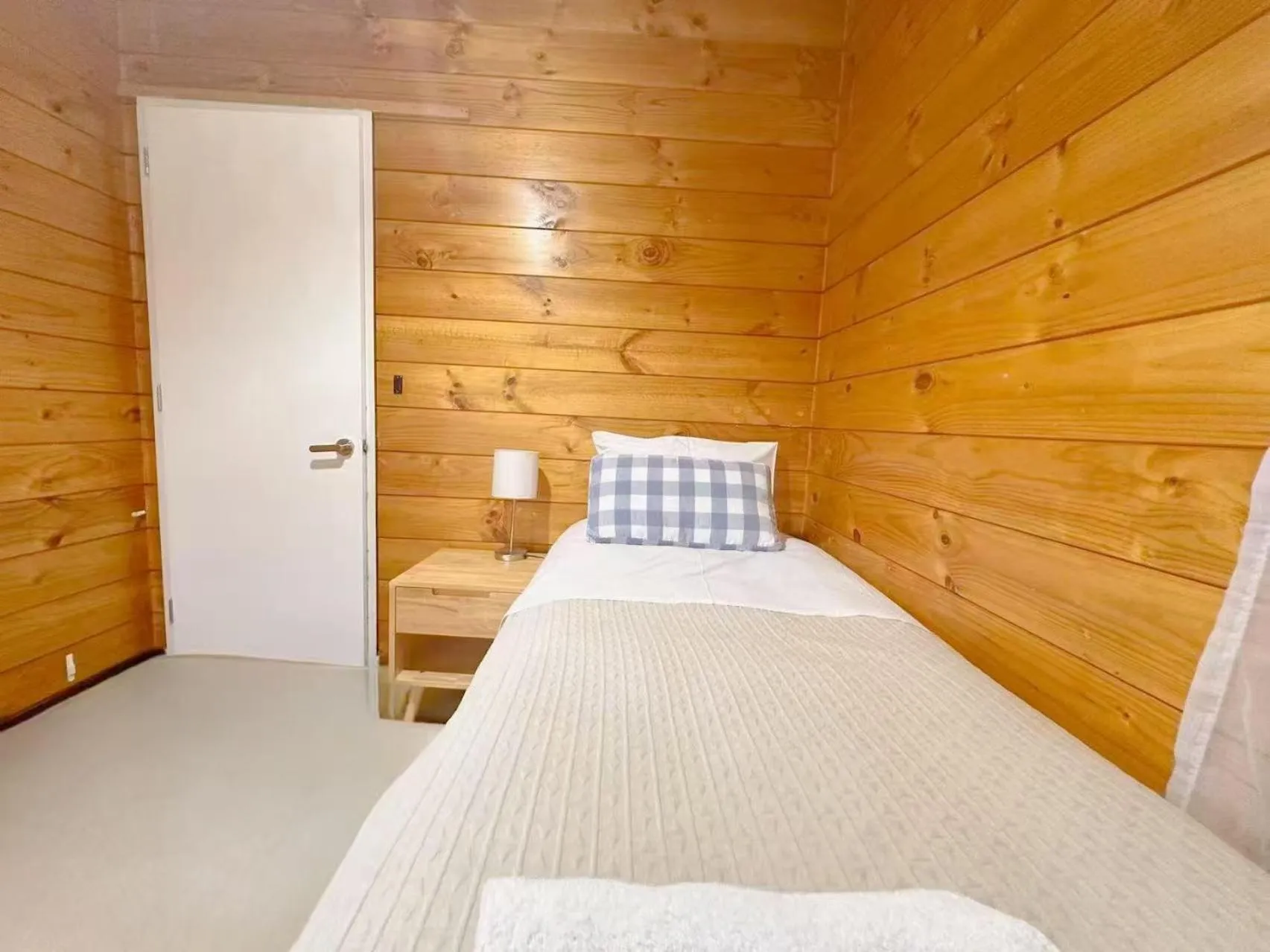 Bed in Orewa Motor Lodge