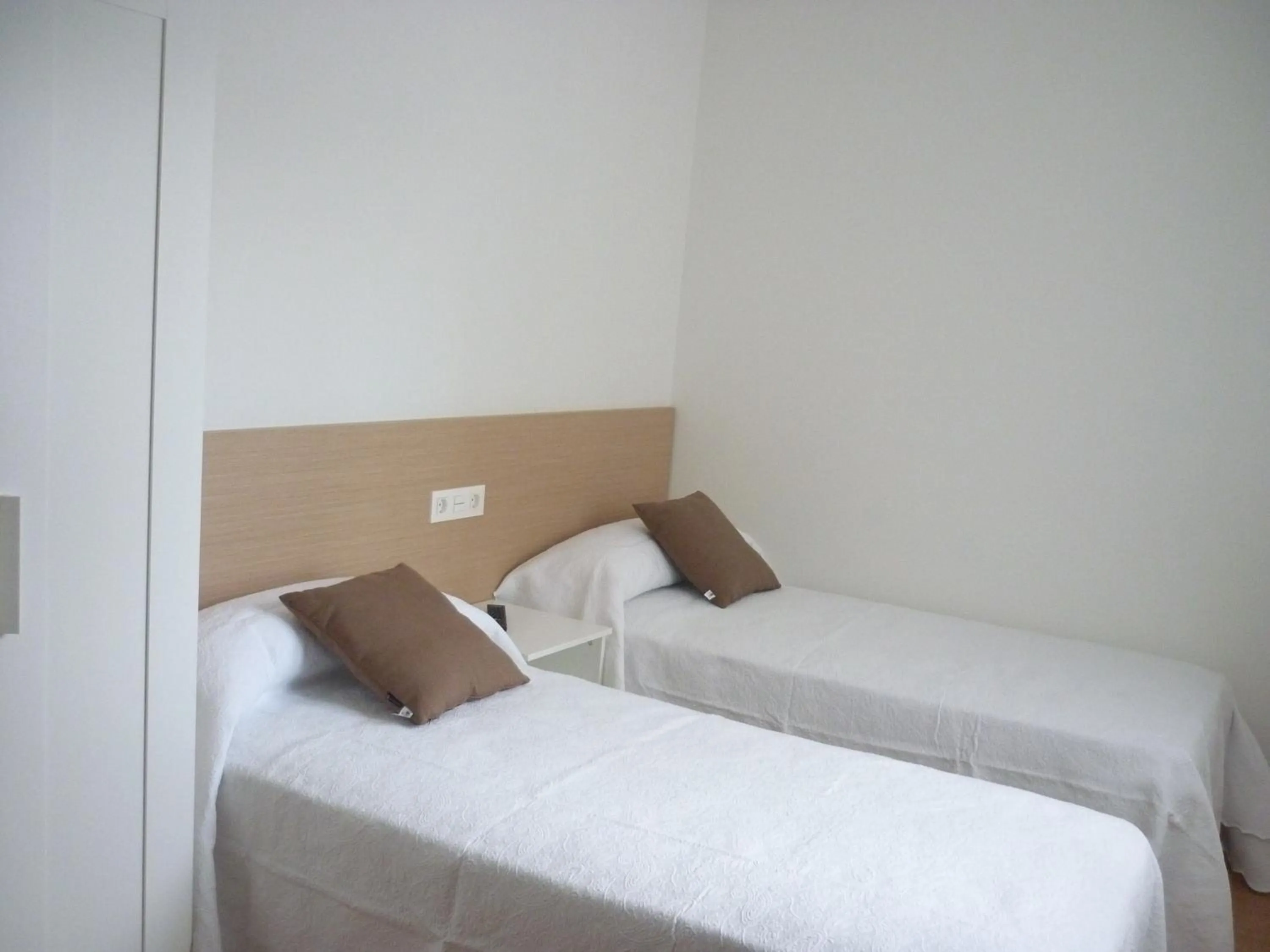 Bed in Pensión-Albergue Puente Ribeira