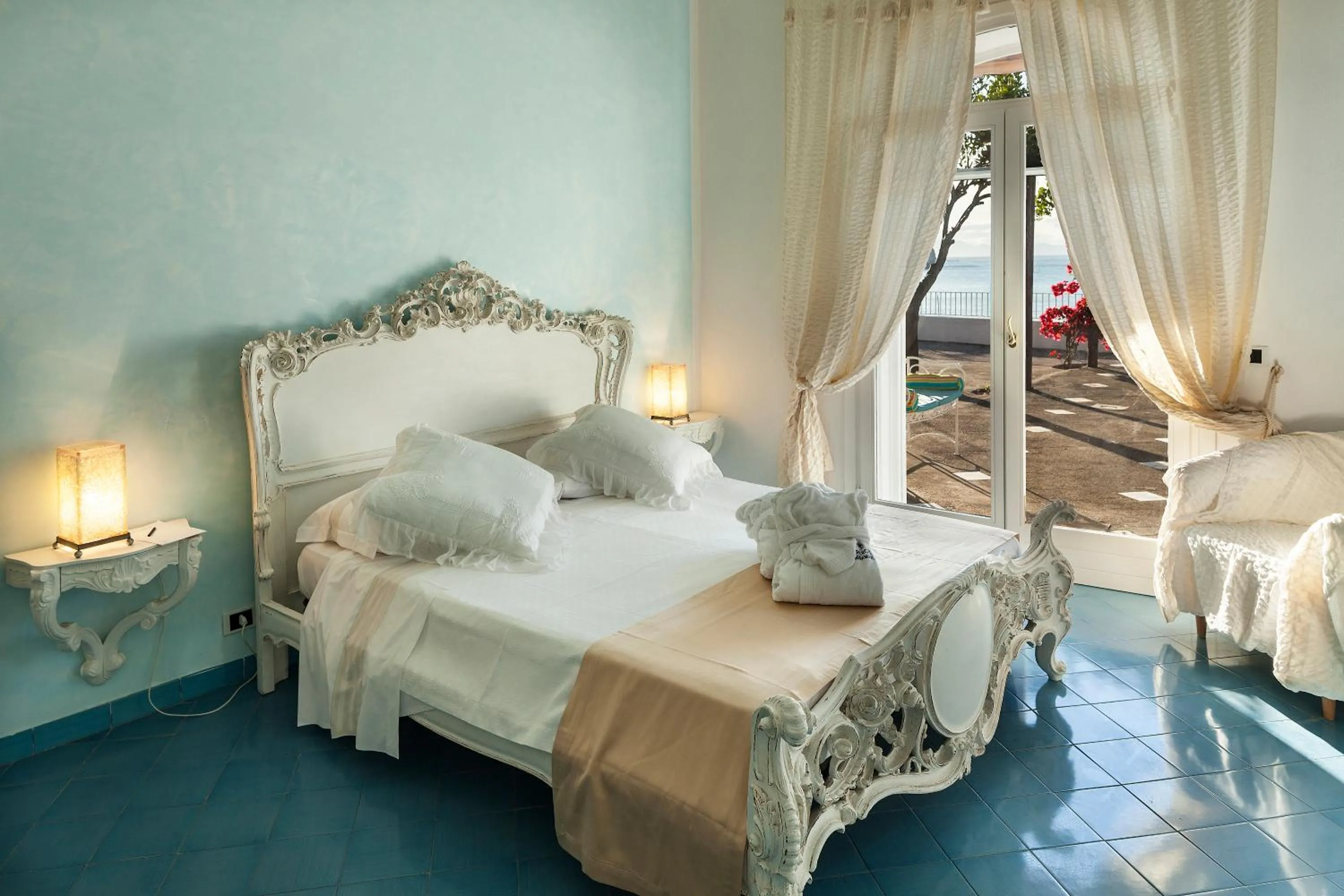 Bed in La Villa Resort & Spa