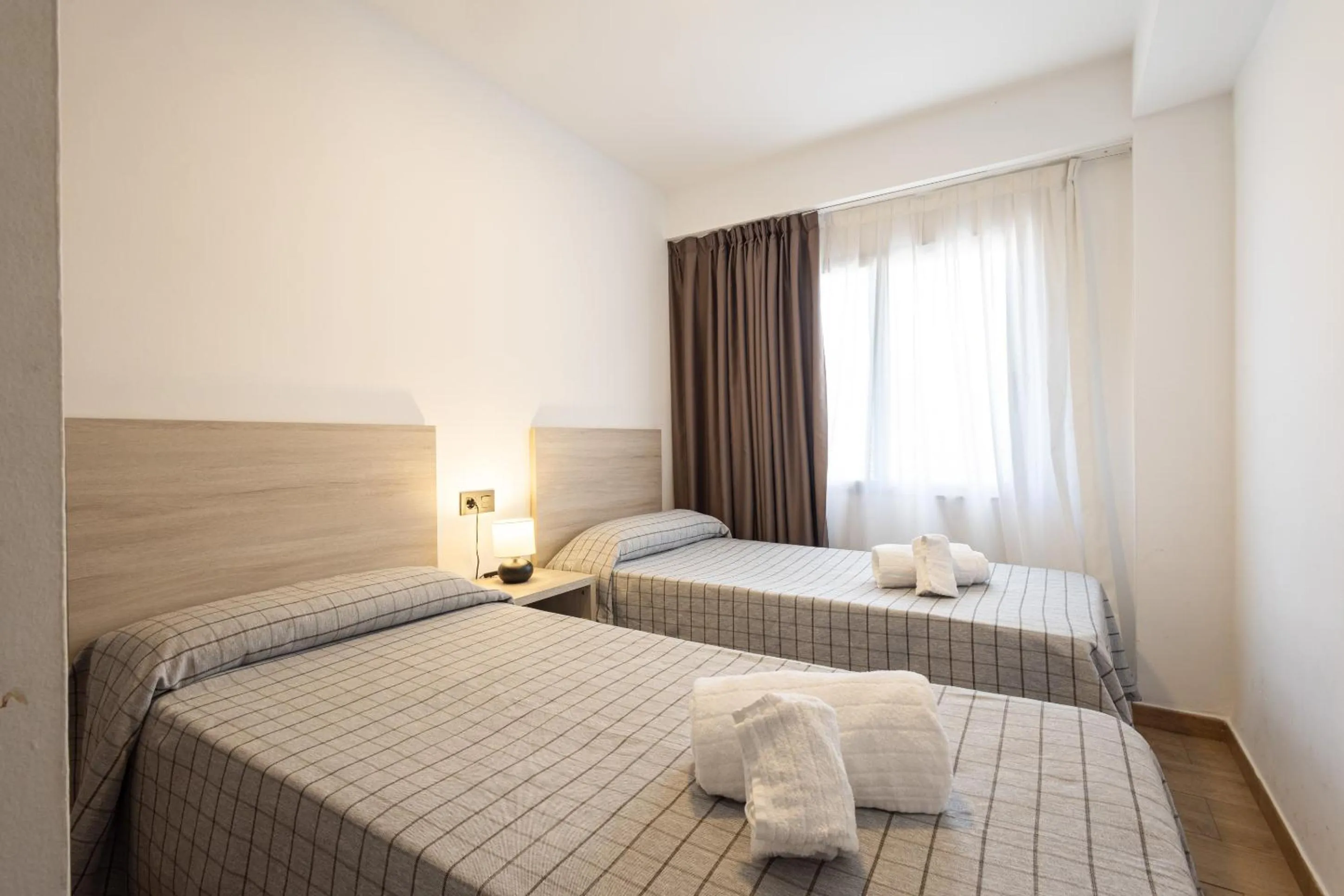 Photo of the whole room, Bed in Apartamentos Odysea By Apartamentos Valentia