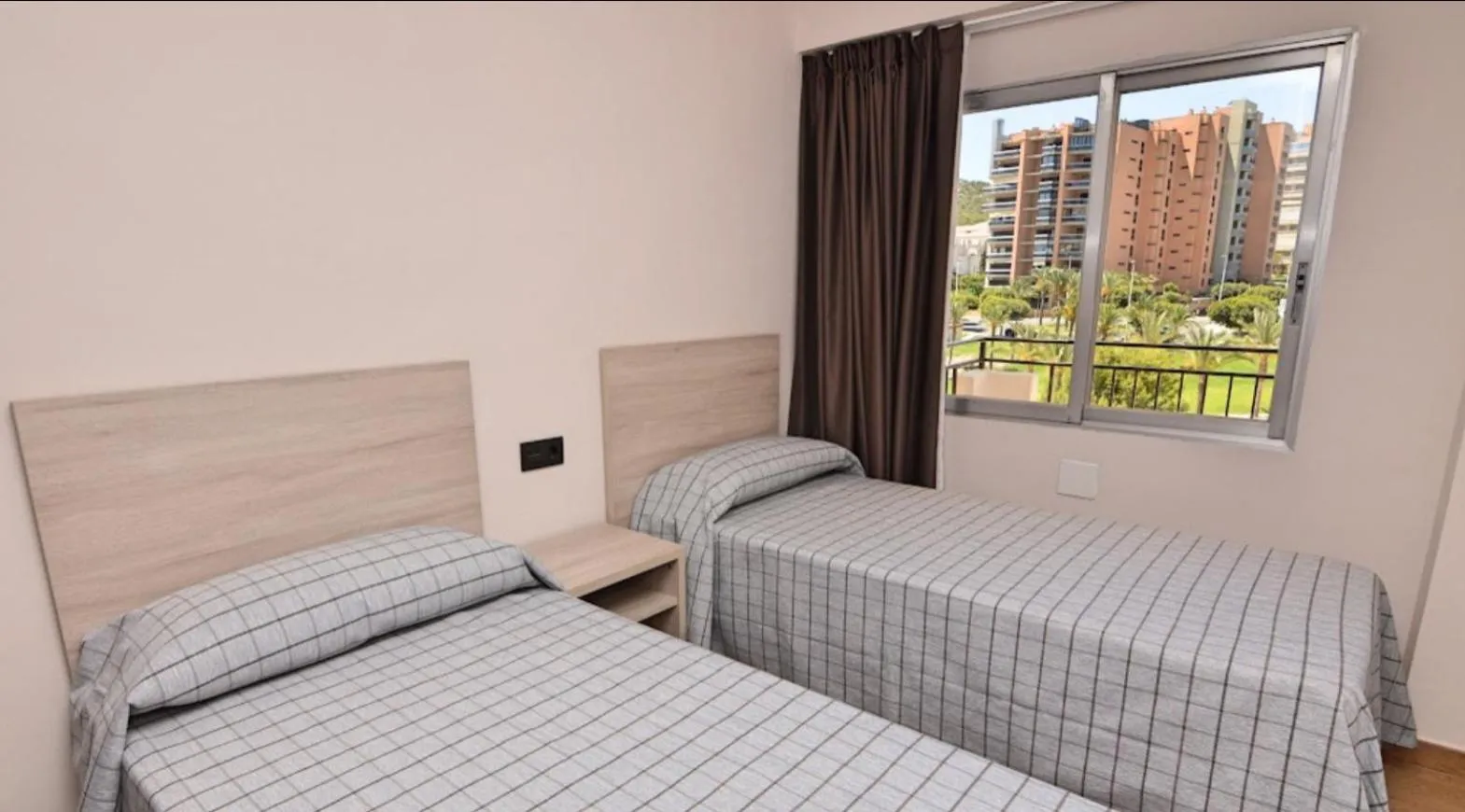 Bed in Apartamentos Odysea By Apartamentos Valentia