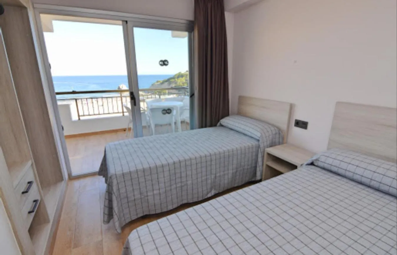 Bed in Apartamentos Odysea By Apartamentos Valentia