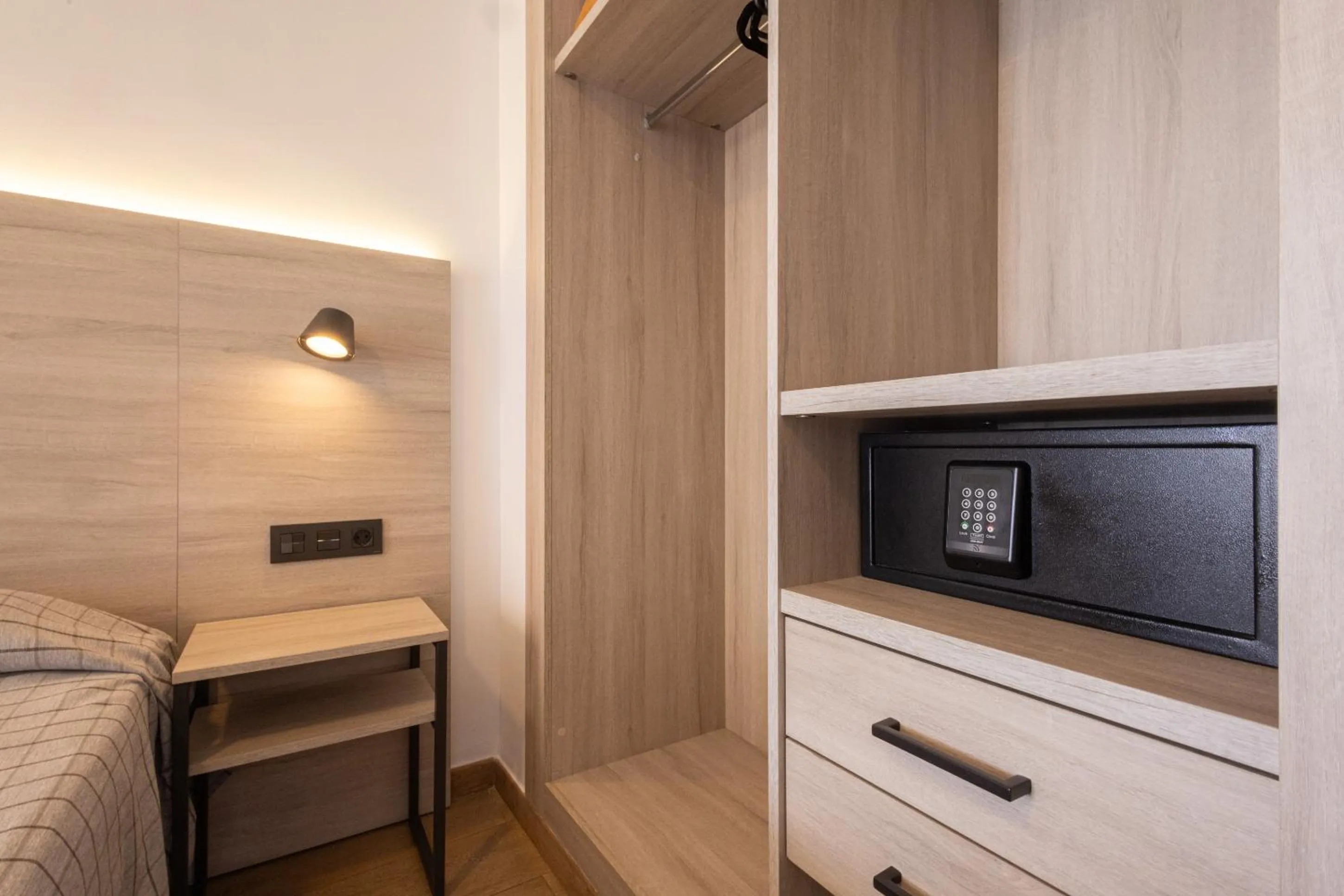 safe, Bed in Apartamentos Odysea By Apartamentos Valentia