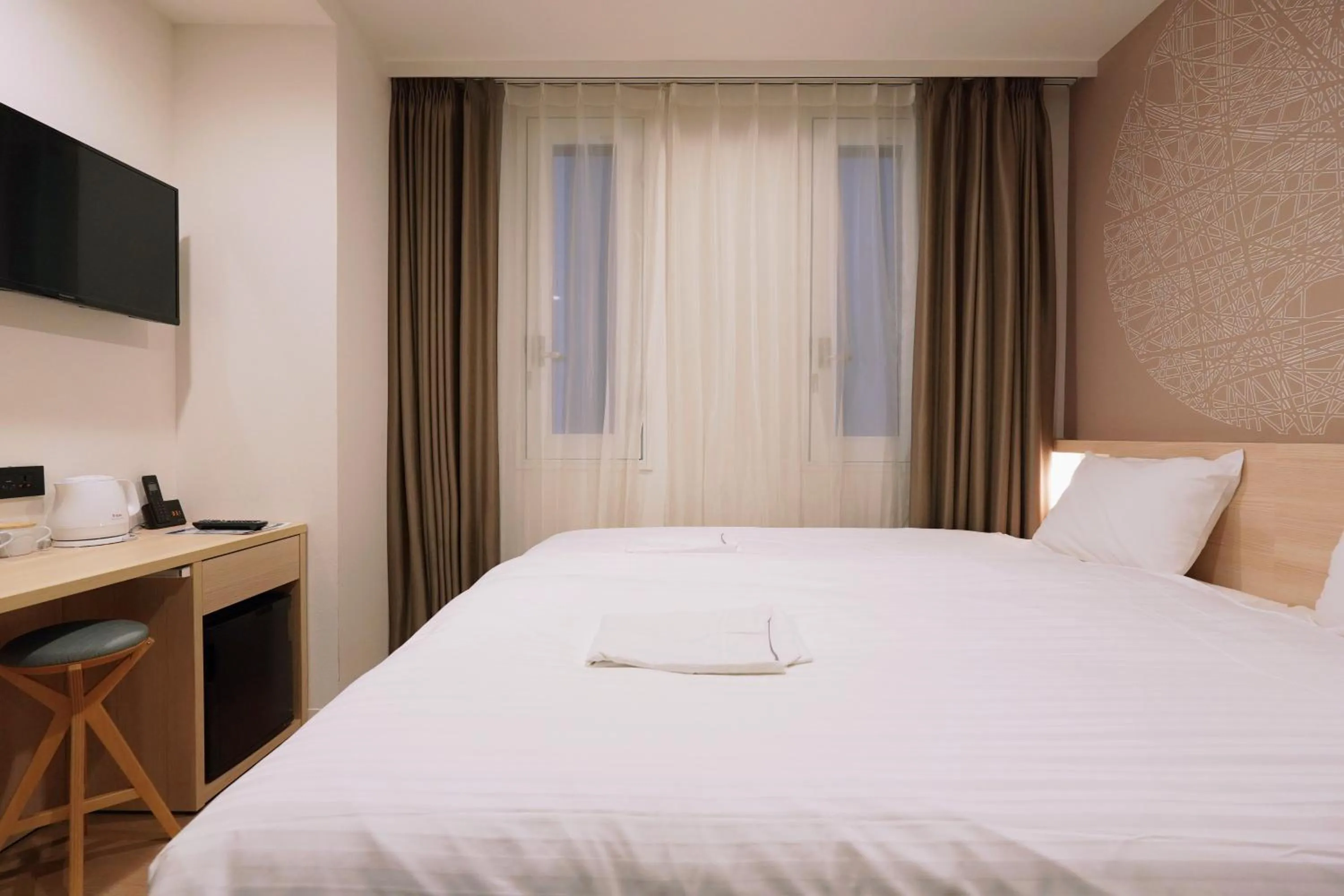 Bed in Park Central Sakura Hotel