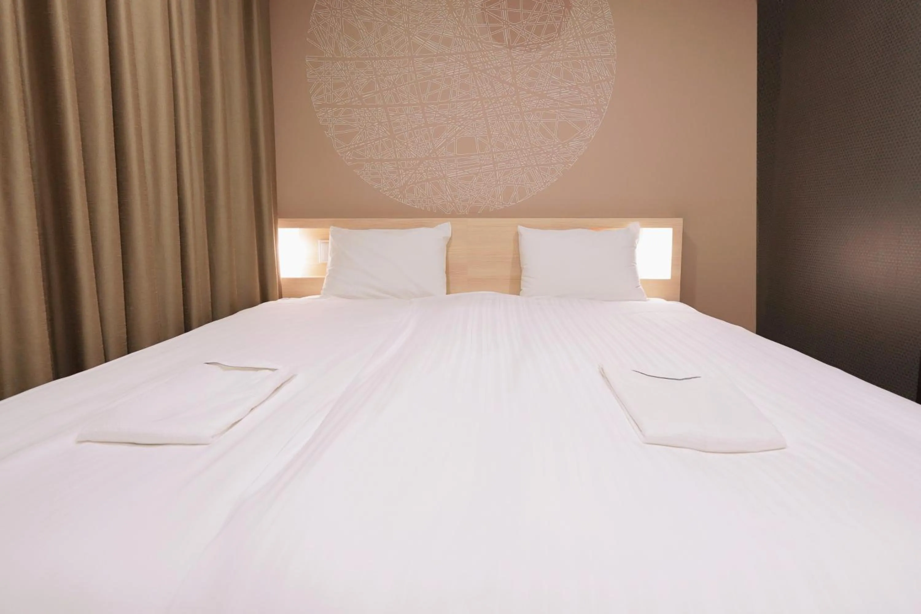 Bed in Park Central Sakura Hotel