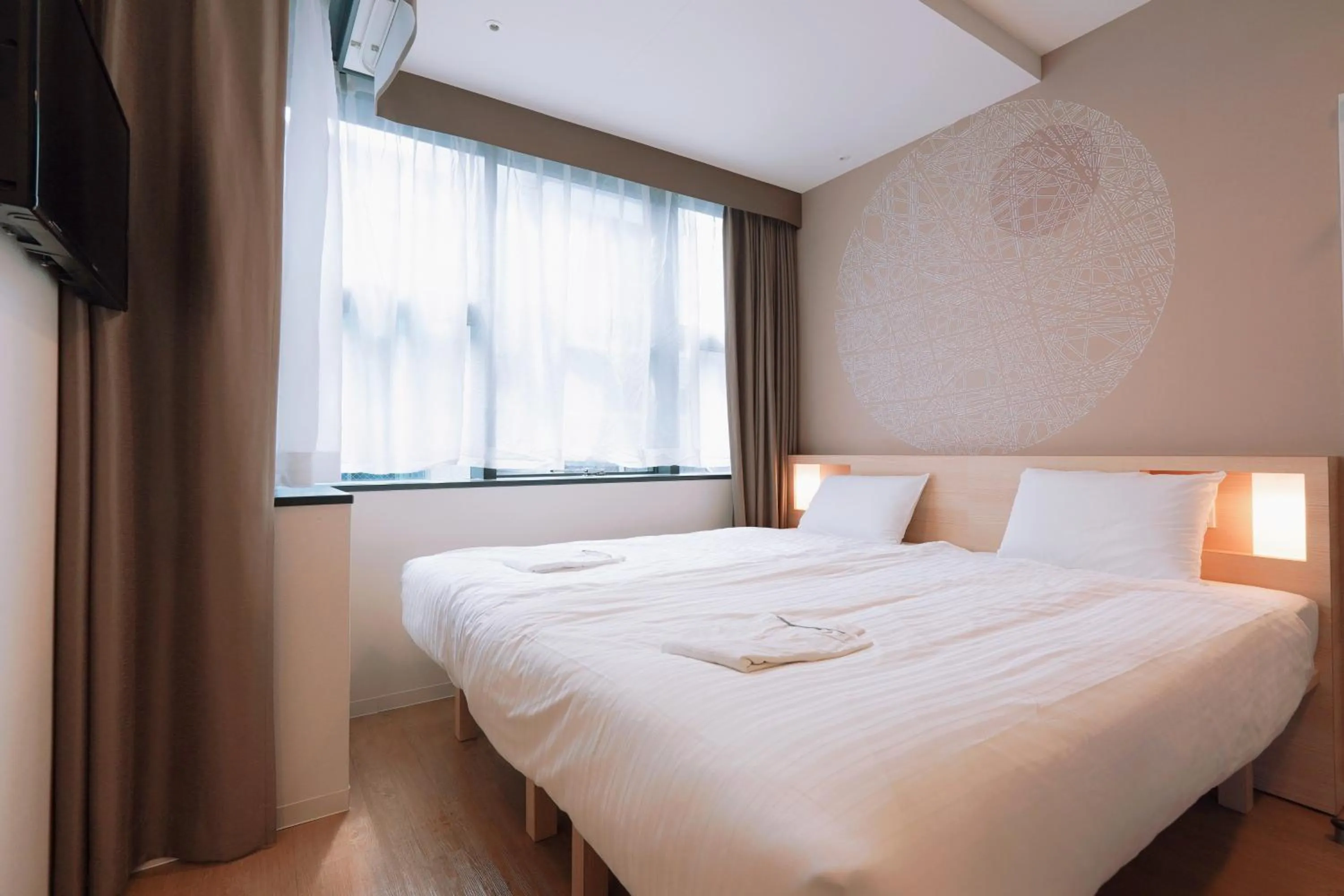 Bed in Park Central Sakura Hotel