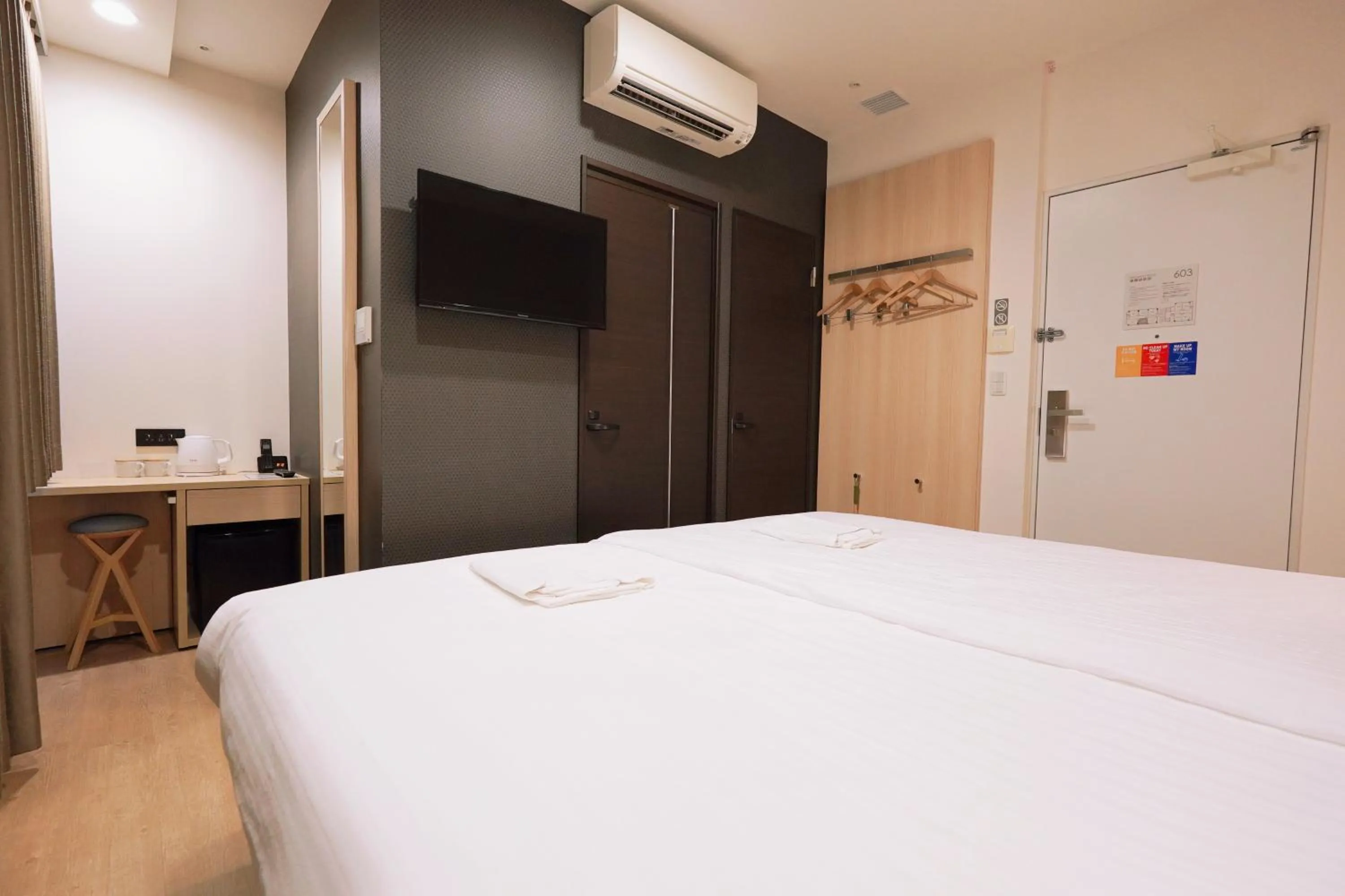 Bed in Park Central Sakura Hotel