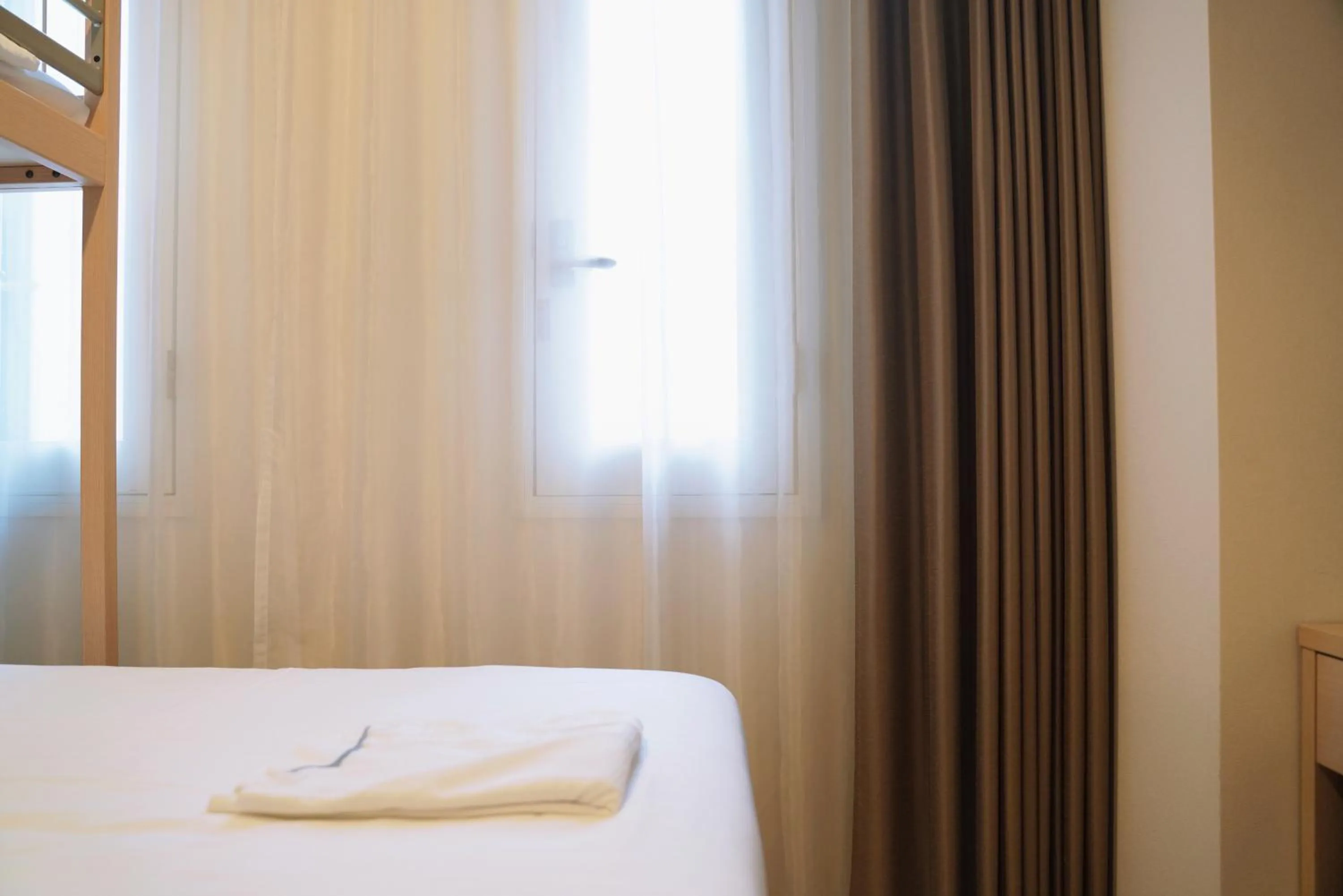 Bedroom, Bed in Park Central Sakura Hotel