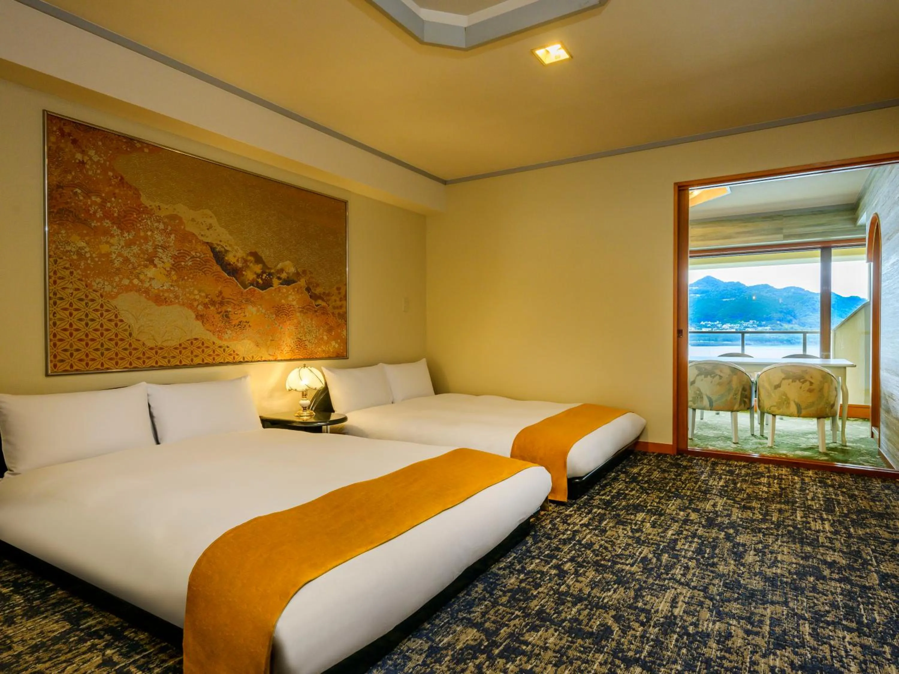 Bed in KAMENOI HOTEL Nachi Katsuura