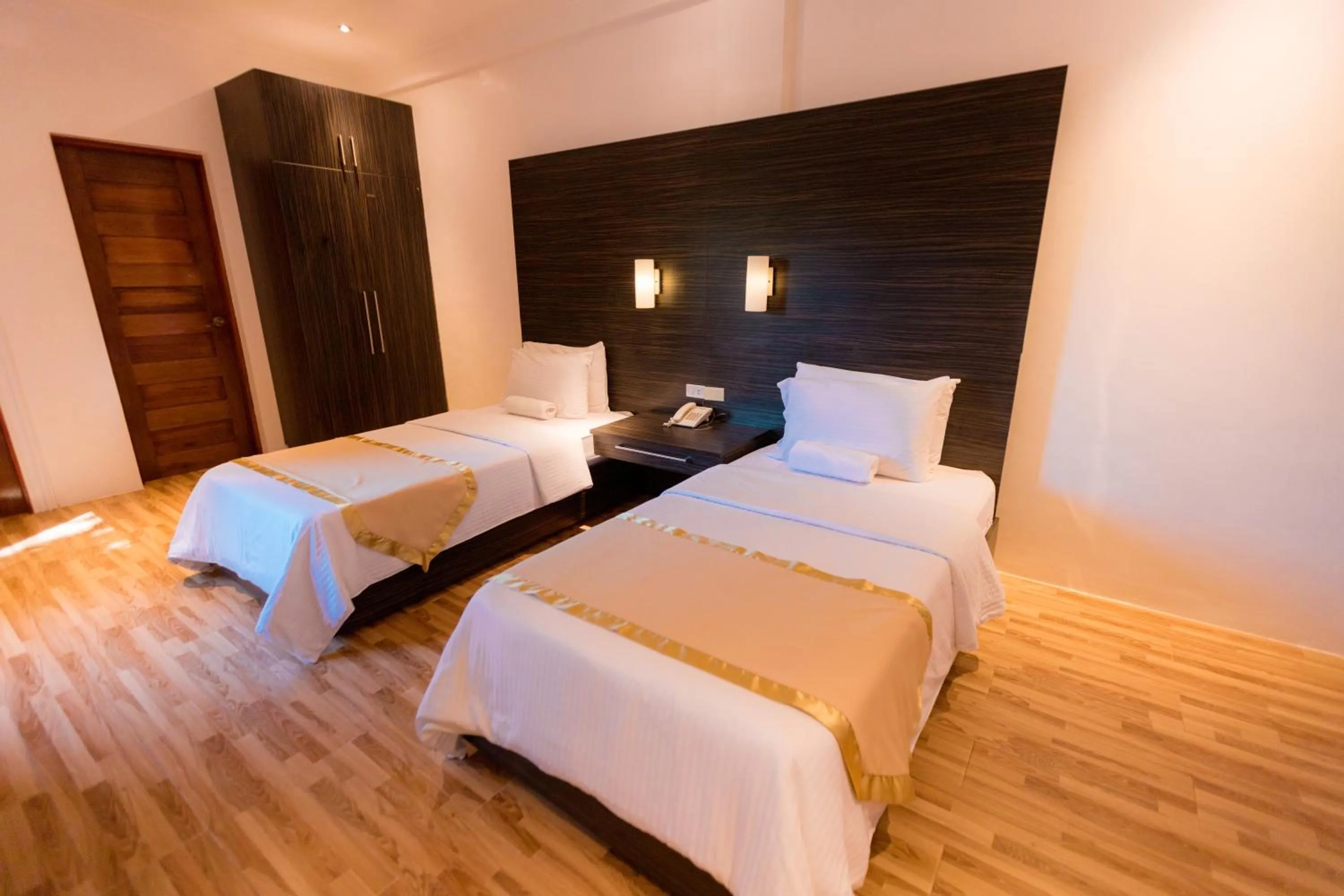 Bed in Bellagio Hills Hotel and Restaurant