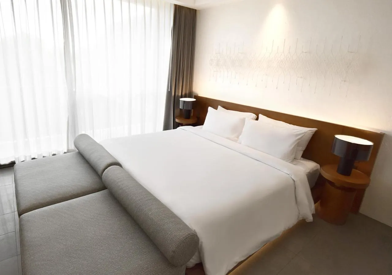 Bed in Arun Khiri Chiang Mai Hotel