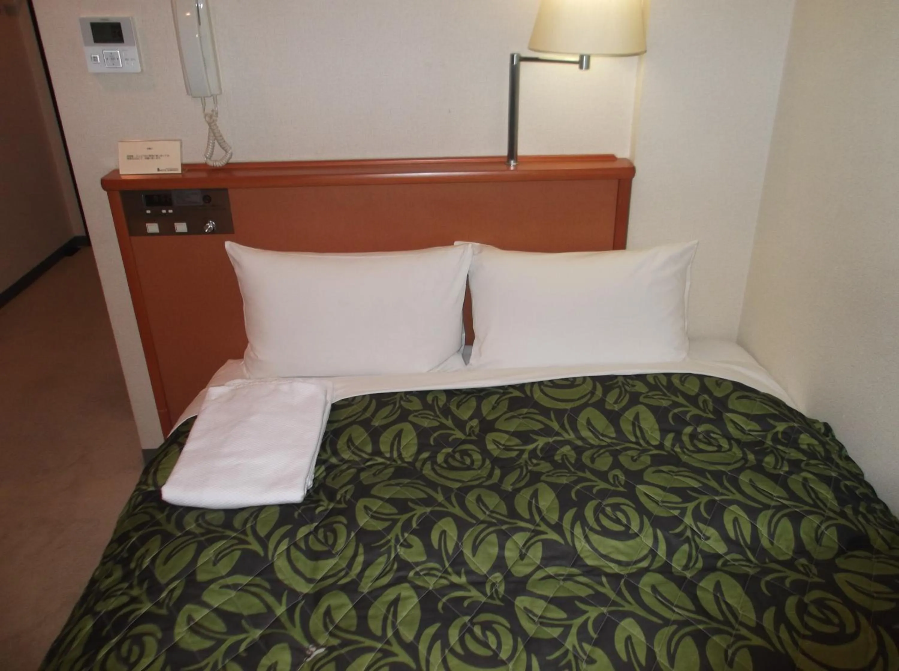 Bed in Hotel Sunrise21