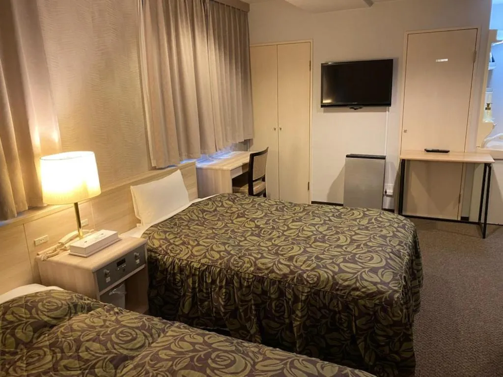 Bed in Hotel Sunrise21