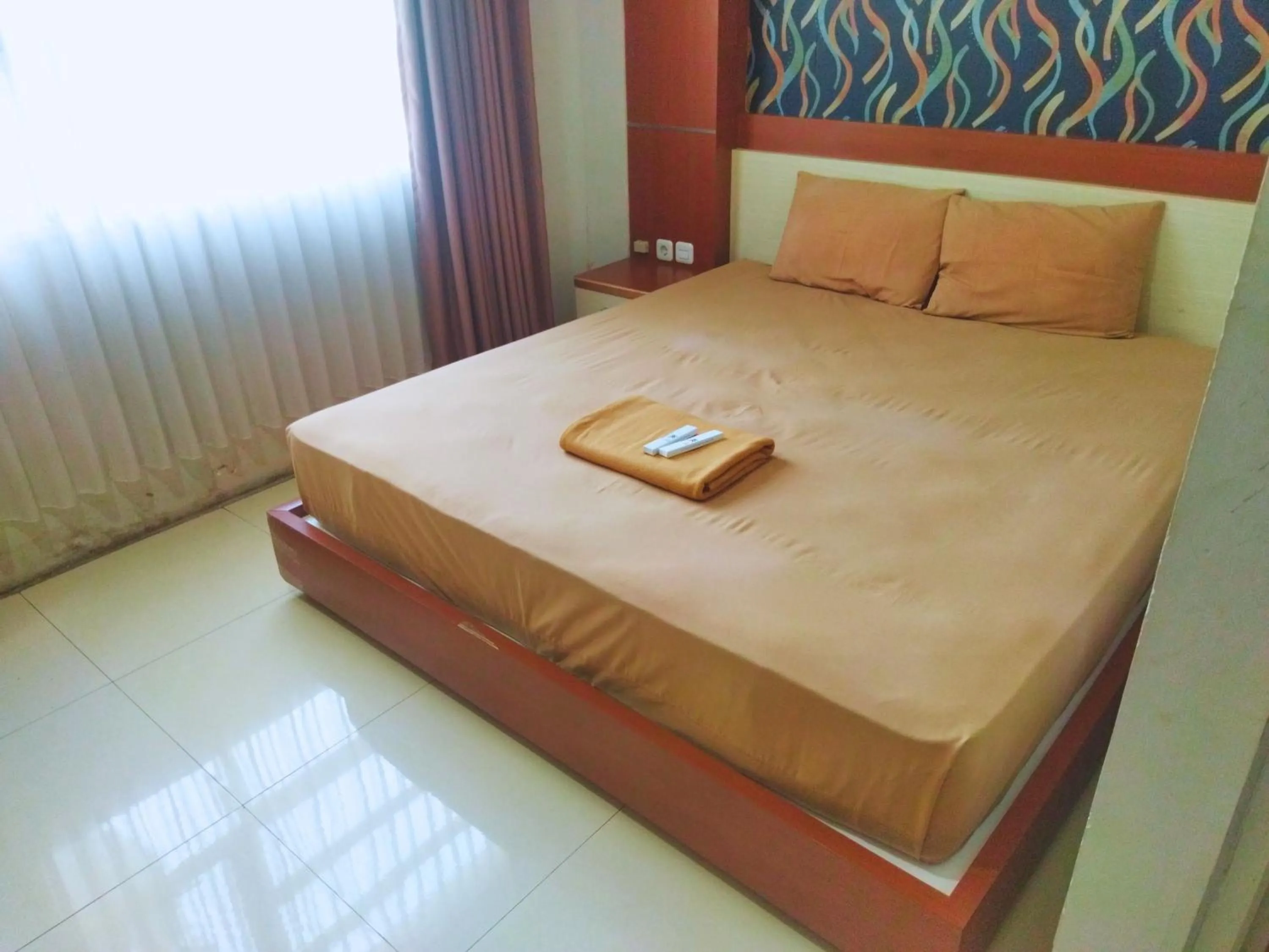 Bed in Hotel Karunia PKPRI