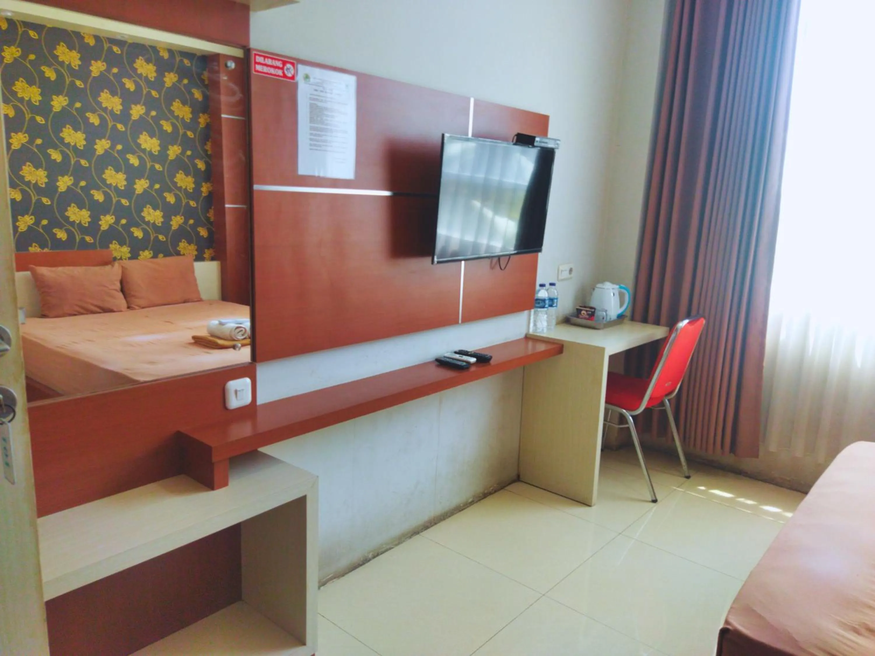 Bed in Hotel Karunia PKPRI