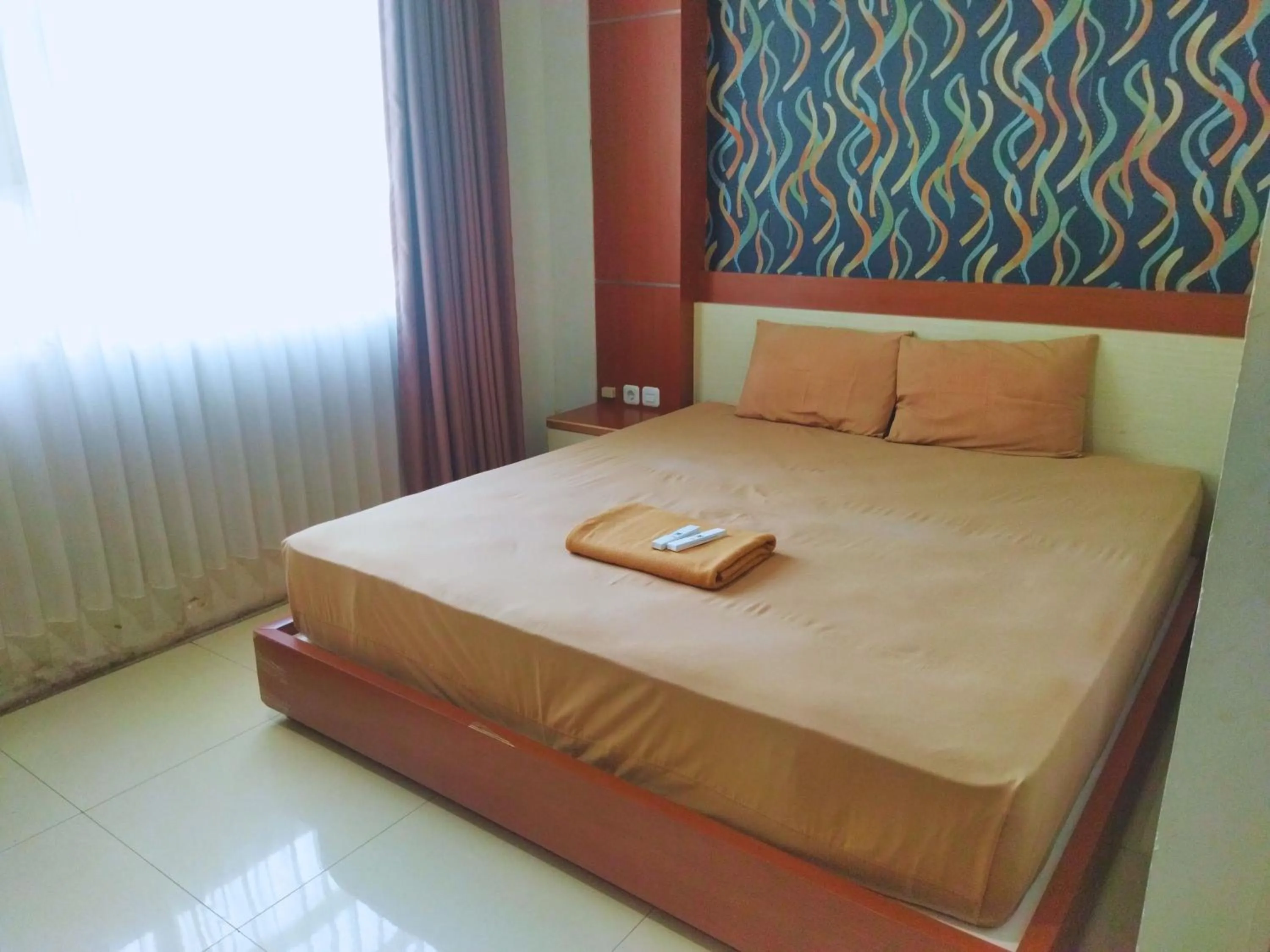 Bed in Hotel Karunia PKPRI