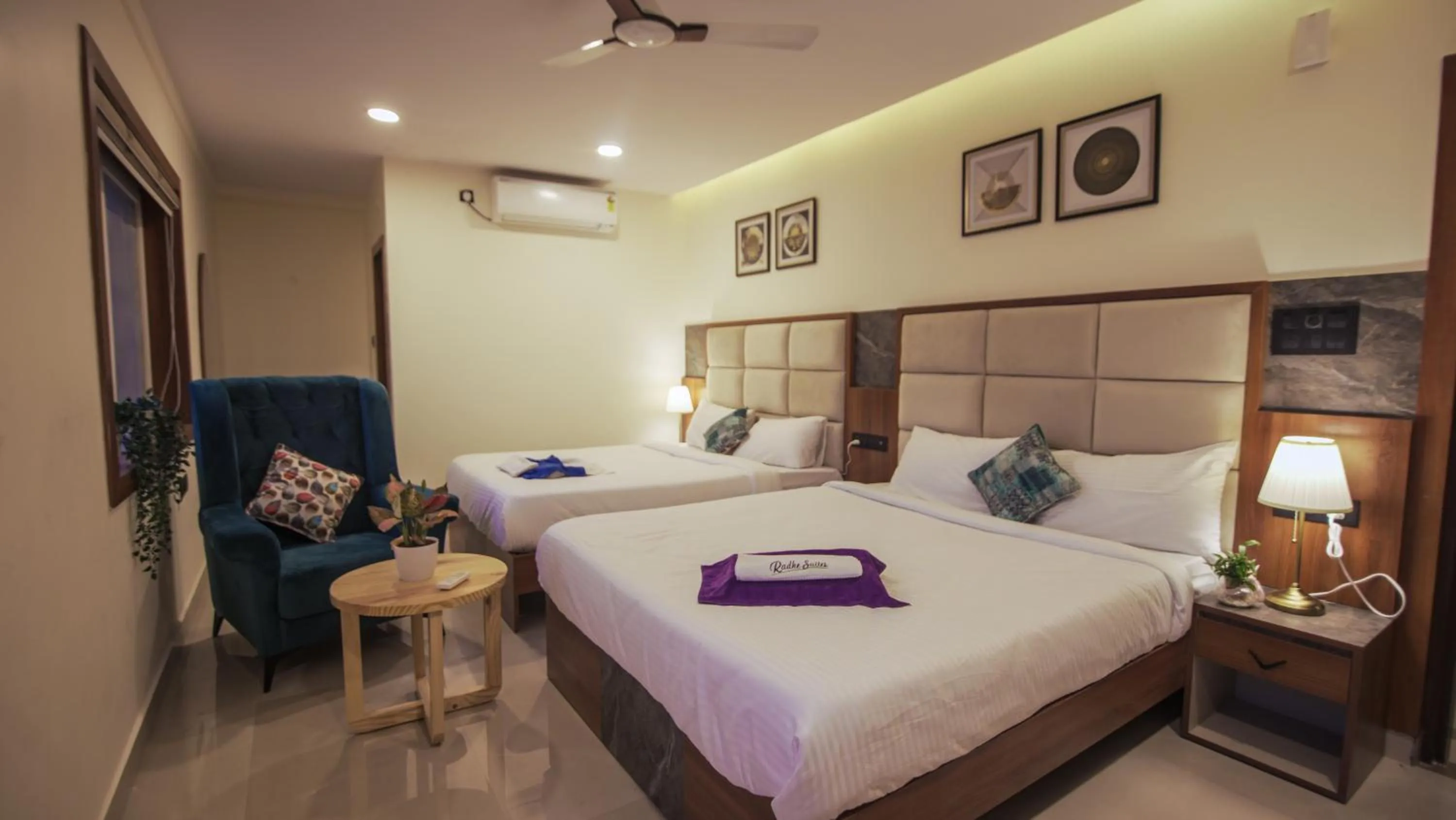 Bed in Radhe Suites