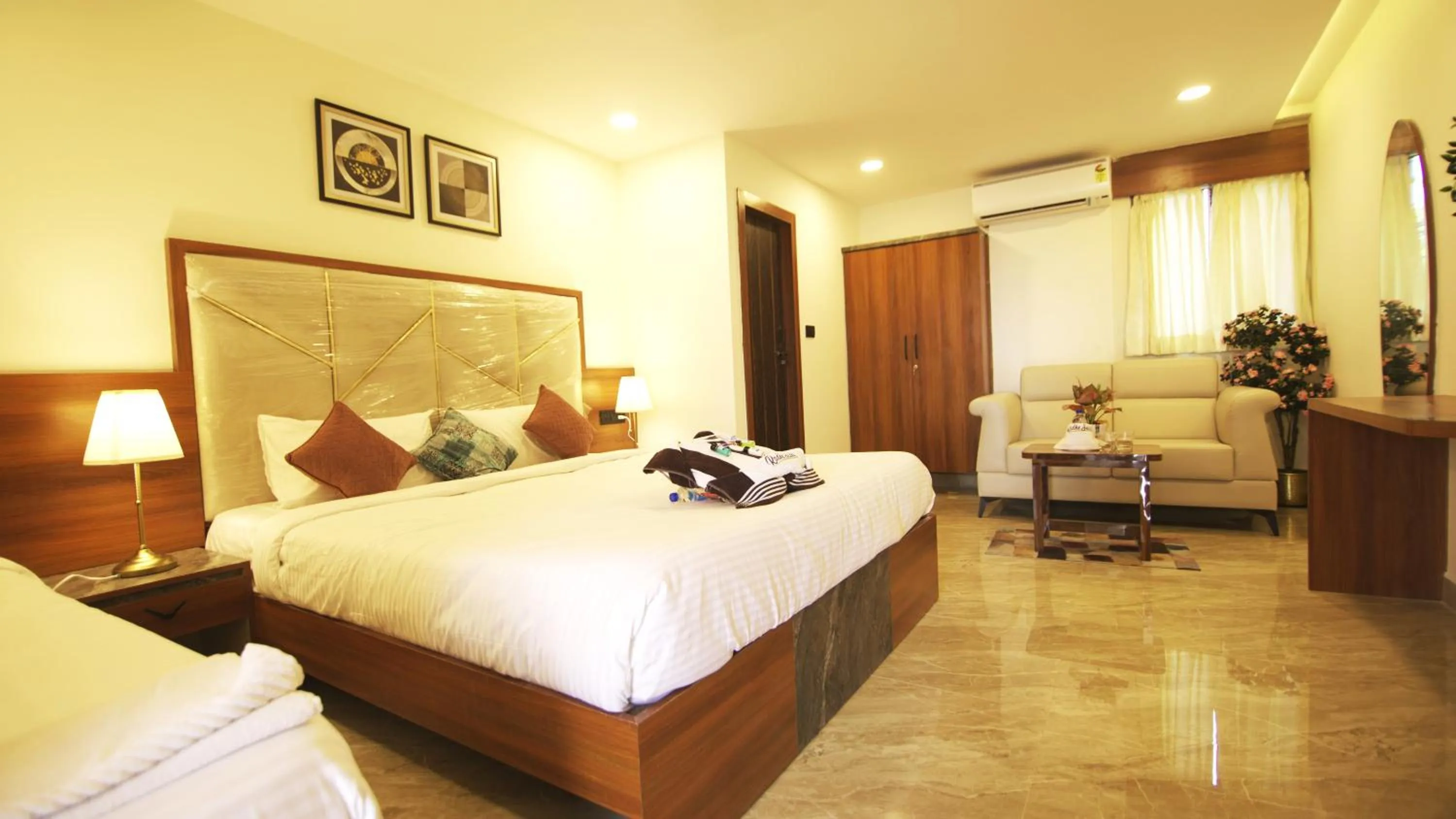 Bed in Radhe Suites