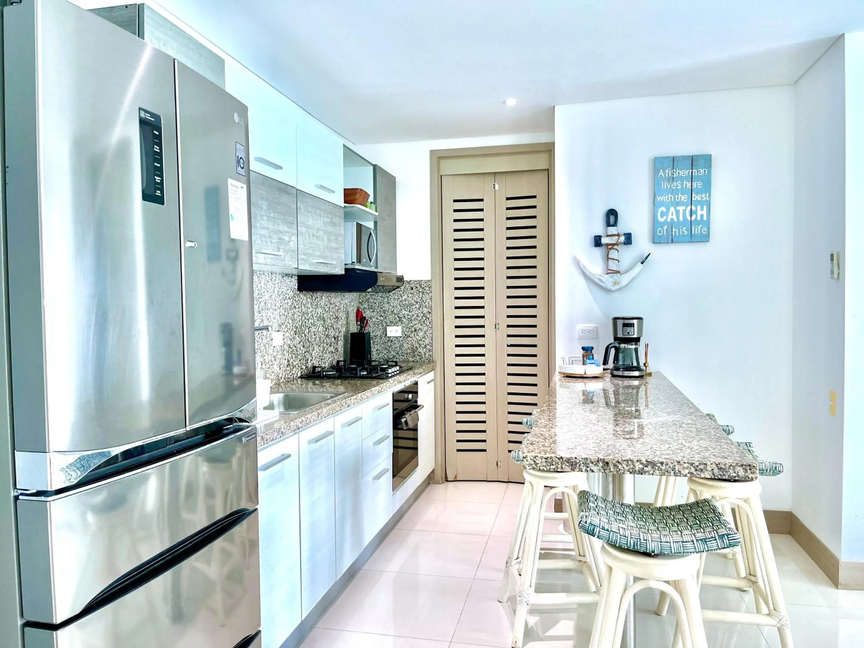 Kitchen or kitchenette in by Calamari Homes - Palmetto Beach 2504 Bocagrande