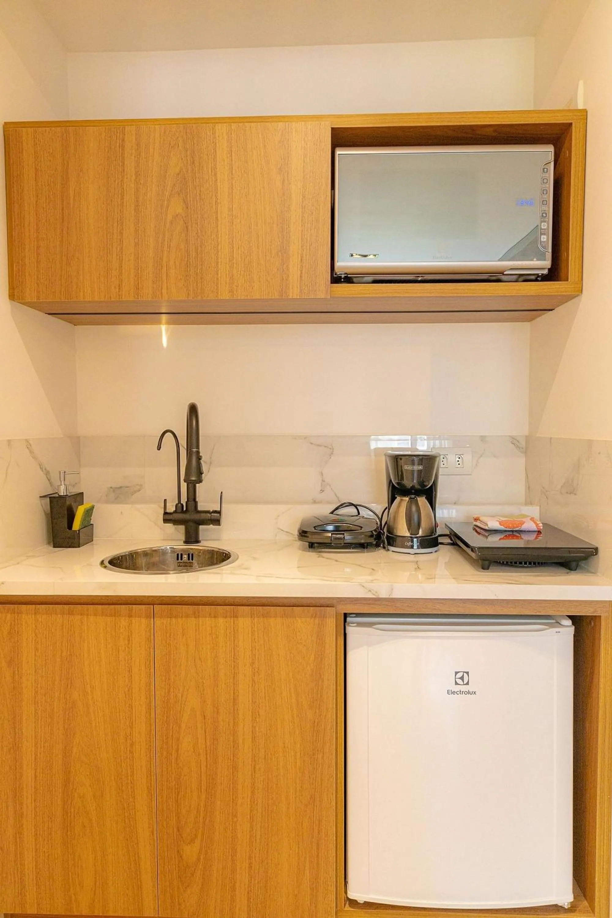 Kitchen or kitchenette in Elegant Flat Internacional Plaza-Garagem e Piscina